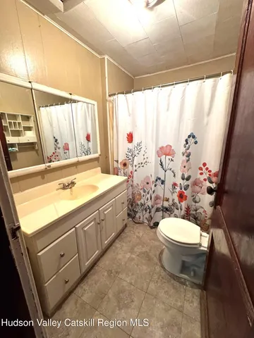 a view of yard with swimming pool