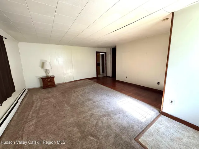 a view of a livingroom with a staircase