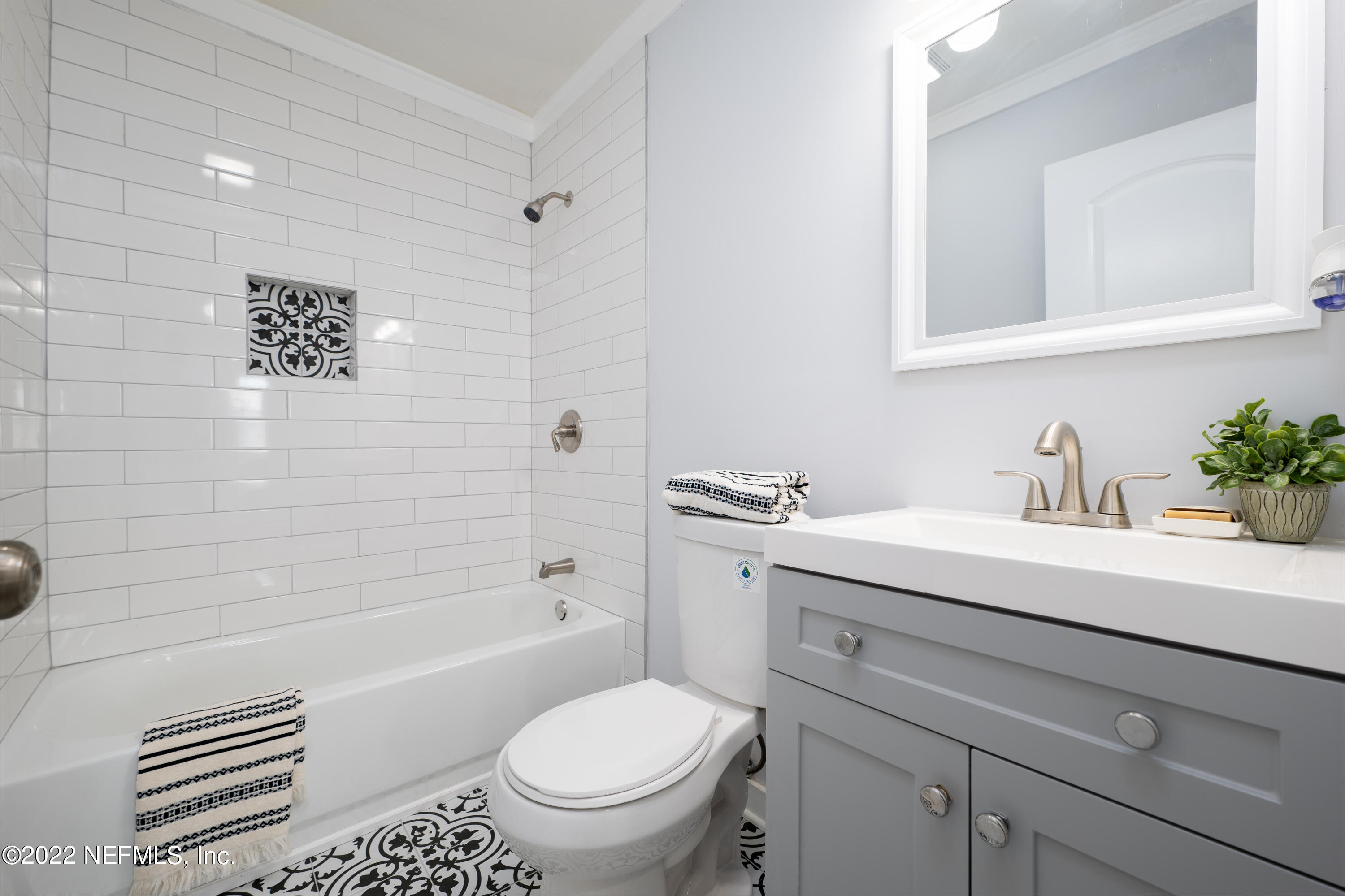 1368 Rensselaer Avenue Jacksonville, FL 32205 - Photo 11 of 48 a bathroom with a sink toilet and shower
