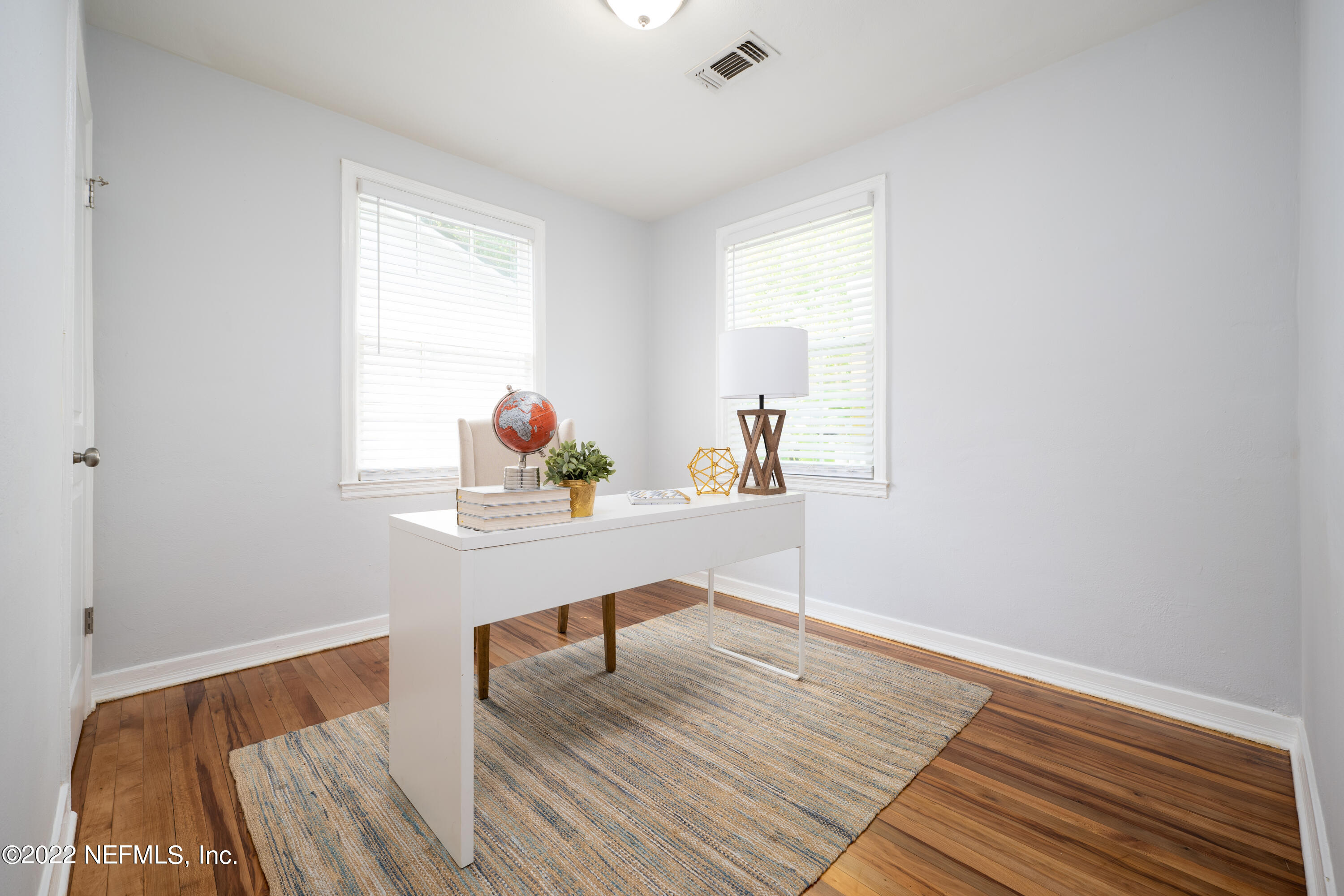 1368 Rensselaer Avenue Jacksonville, FL 32205 - Photo 13 of 48 a workspace with wooden floor