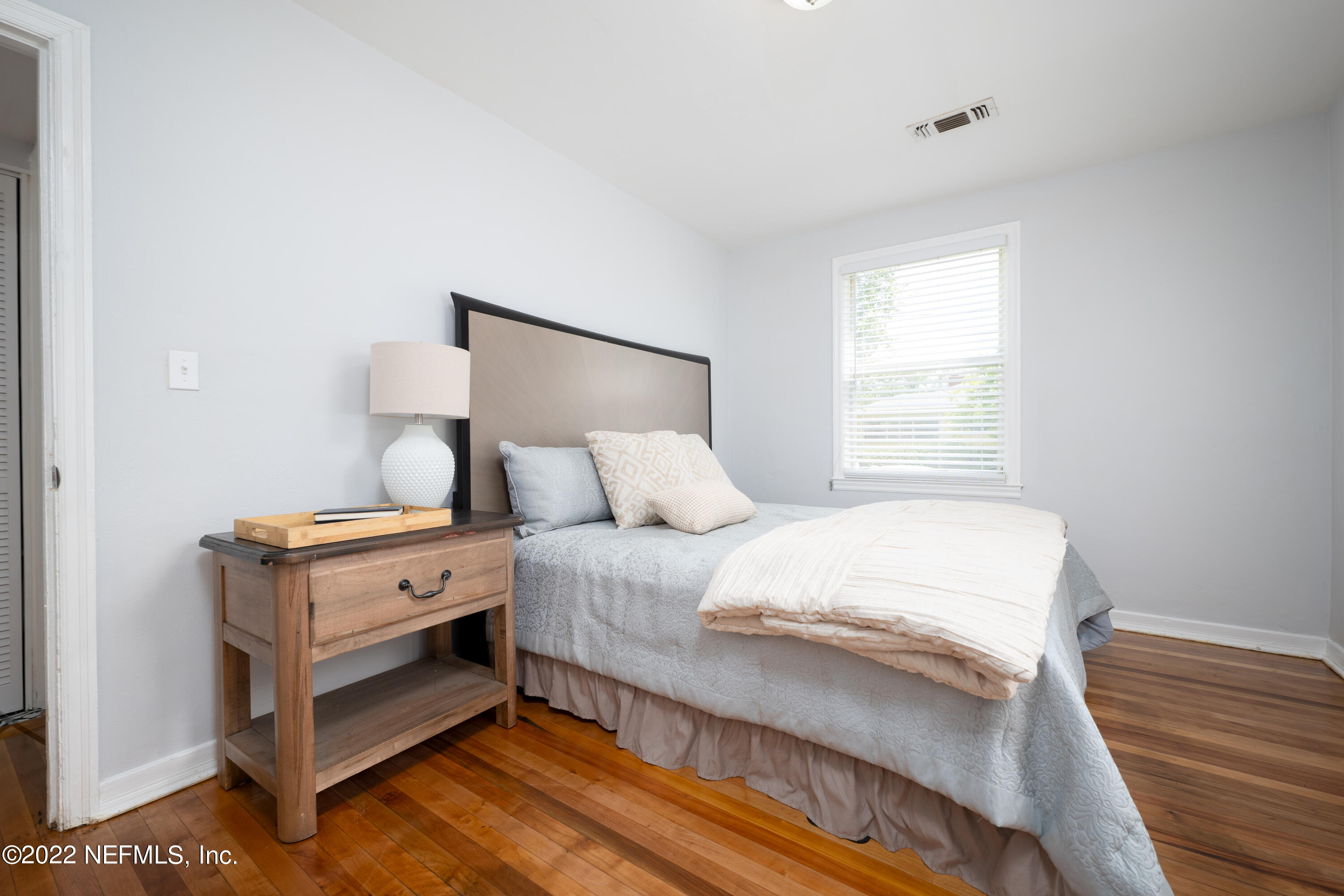 1368 Rensselaer Avenue Jacksonville, FL 32205 - Photo 16 of 48 a bedroom with a bed and a window