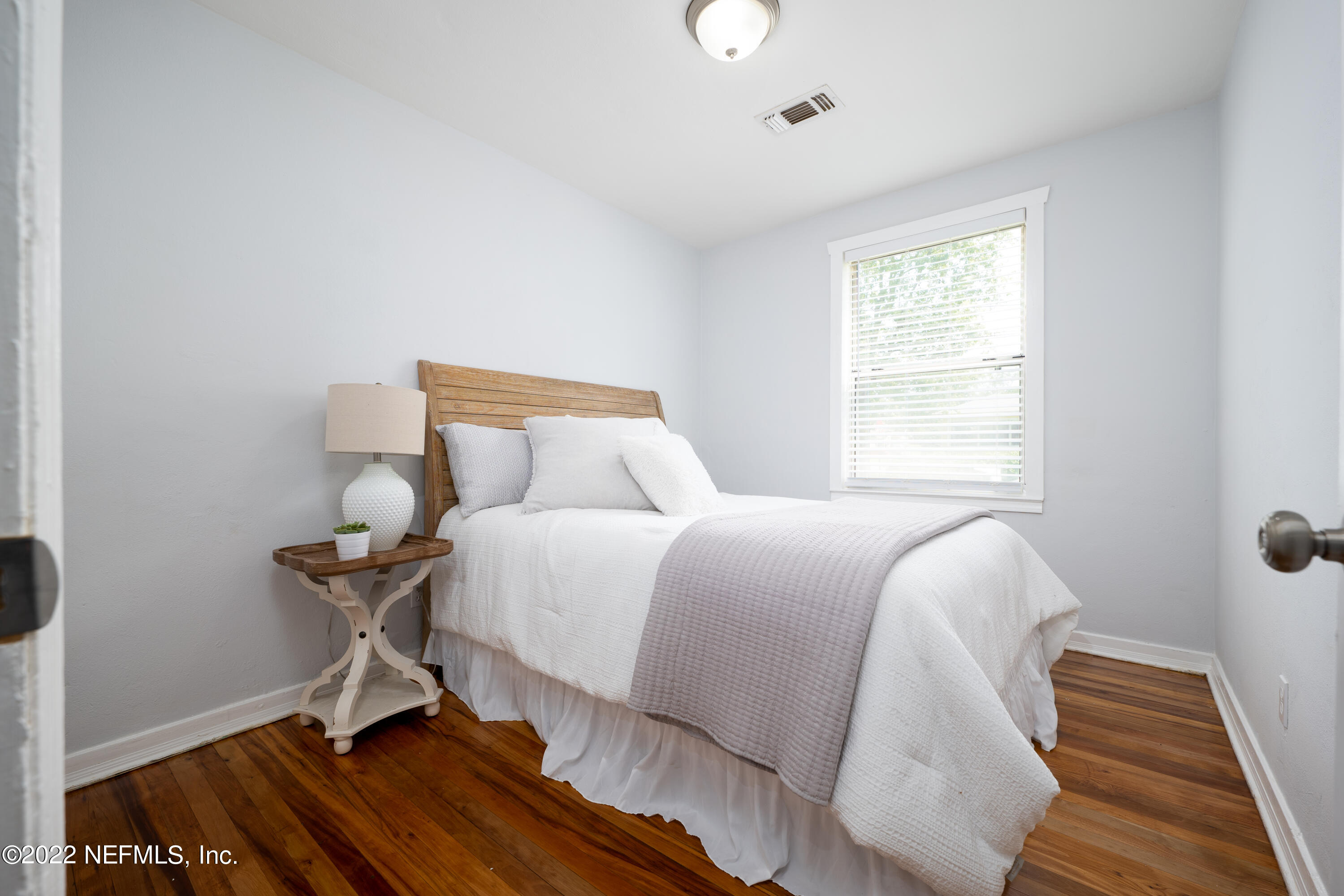 1368 Rensselaer Avenue Jacksonville, FL 32205 - Photo 17 of 48 a bedroom with a bed and a window