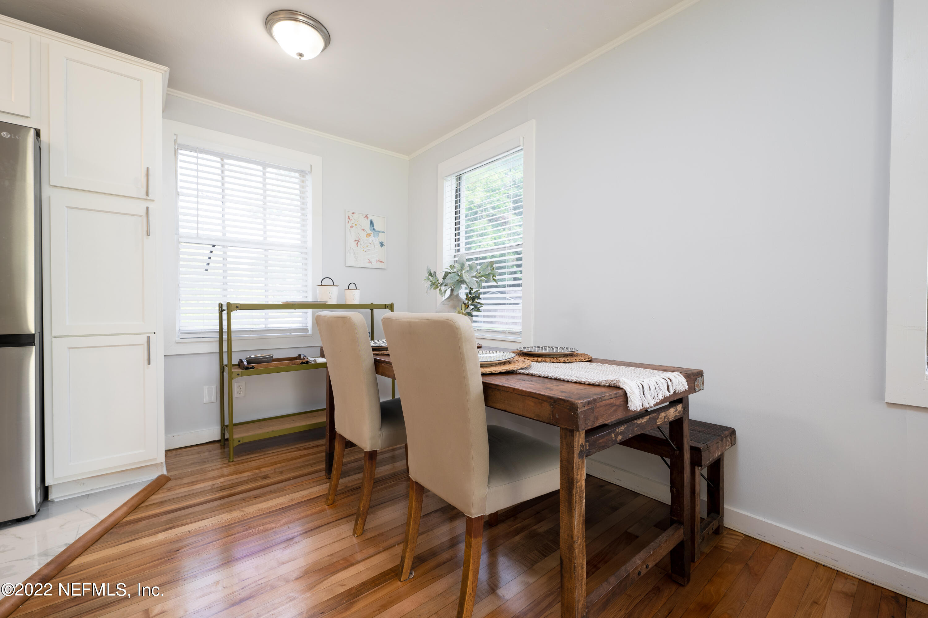 1368 Rensselaer Avenue Jacksonville, FL 32205 - Photo 19 of 48 a view of a dining room with furniture window and wooden floor