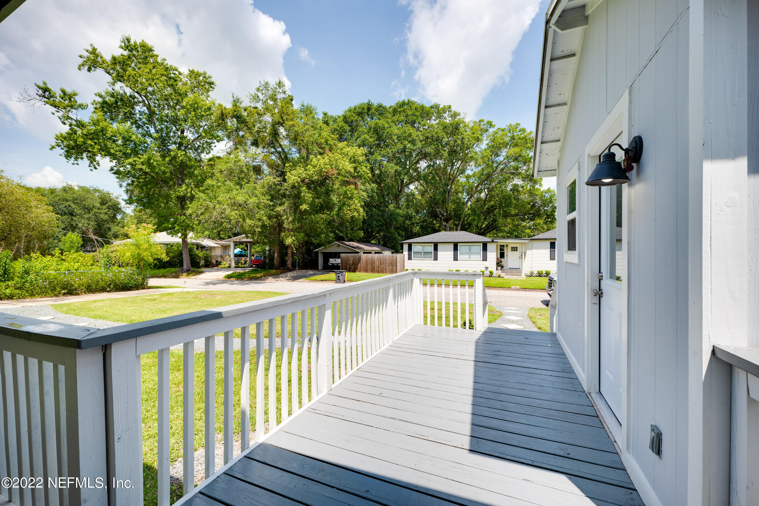 1368 Rensselaer Avenue Jacksonville, FL 32205 - Photo 25 of 48 a view of balcony with wooden floor and seating space