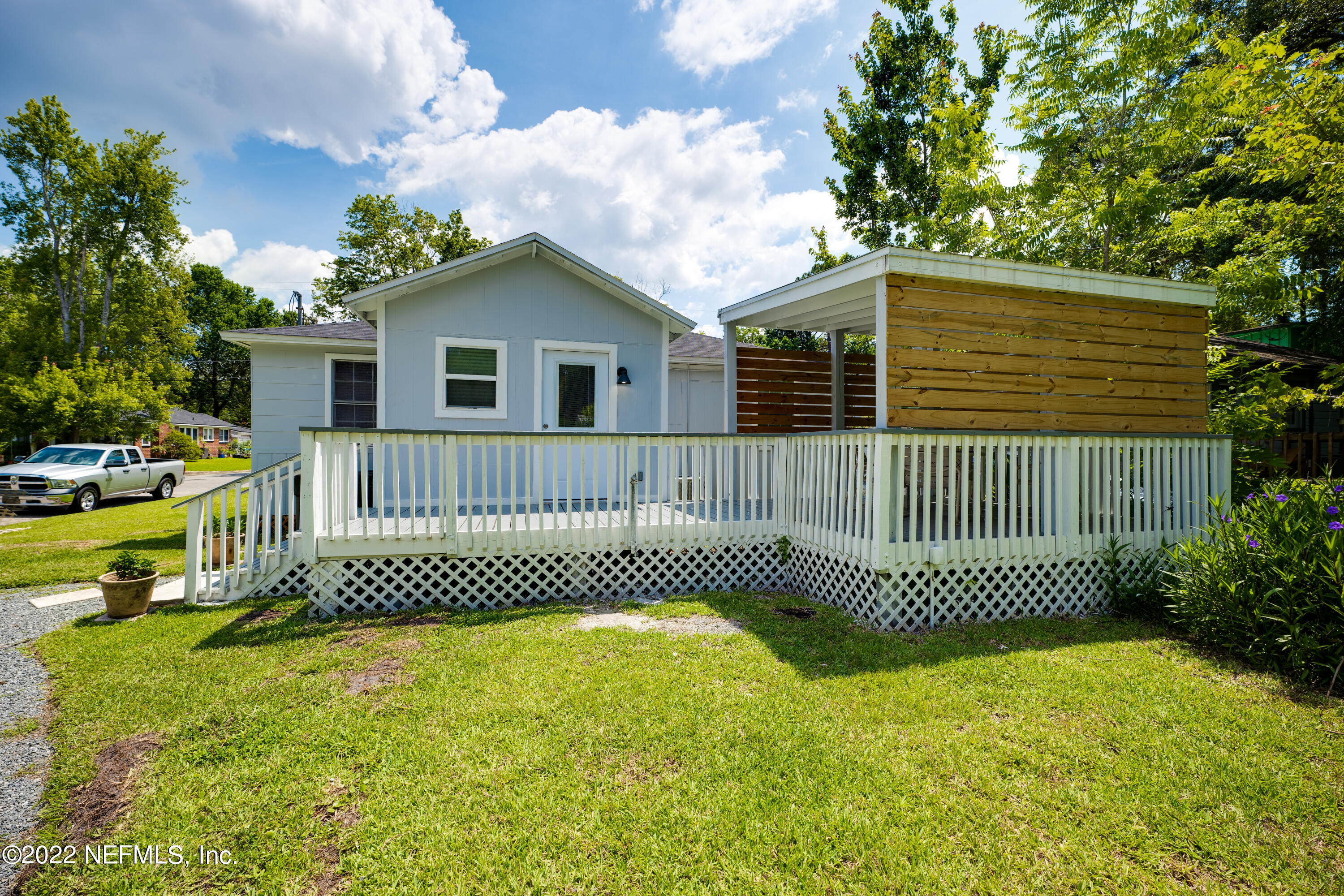 1368 Rensselaer Avenue Jacksonville, FL 32205 - Photo 27 of 48 a front view of a house with a garden