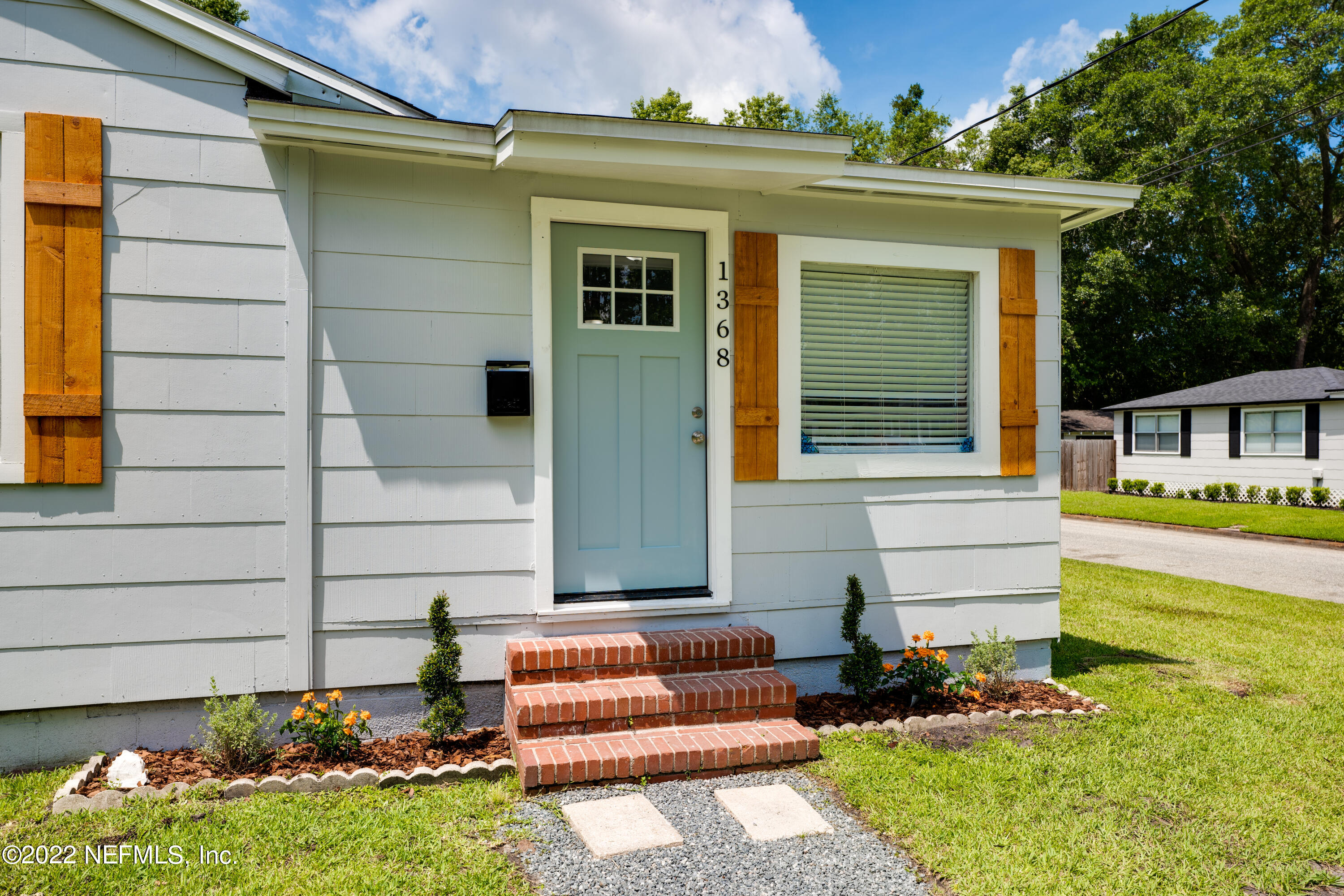 1368 Rensselaer Avenue Jacksonville, FL 32205 - Photo 5 of 48 a front view of a house with garden