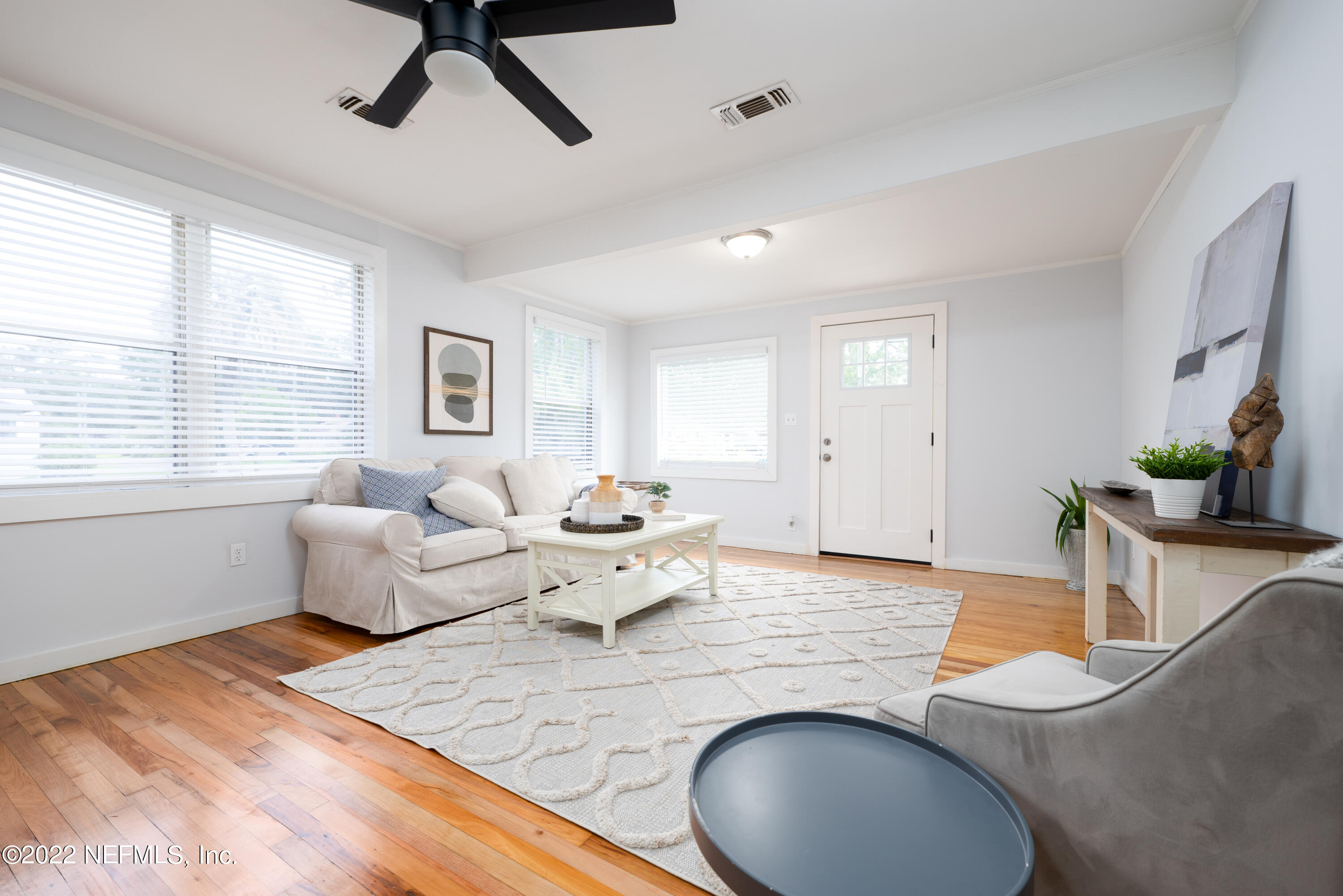 1368 Rensselaer Avenue Jacksonville, FL 32205 - Photo 7 of 48 a living room with furniture and a large window