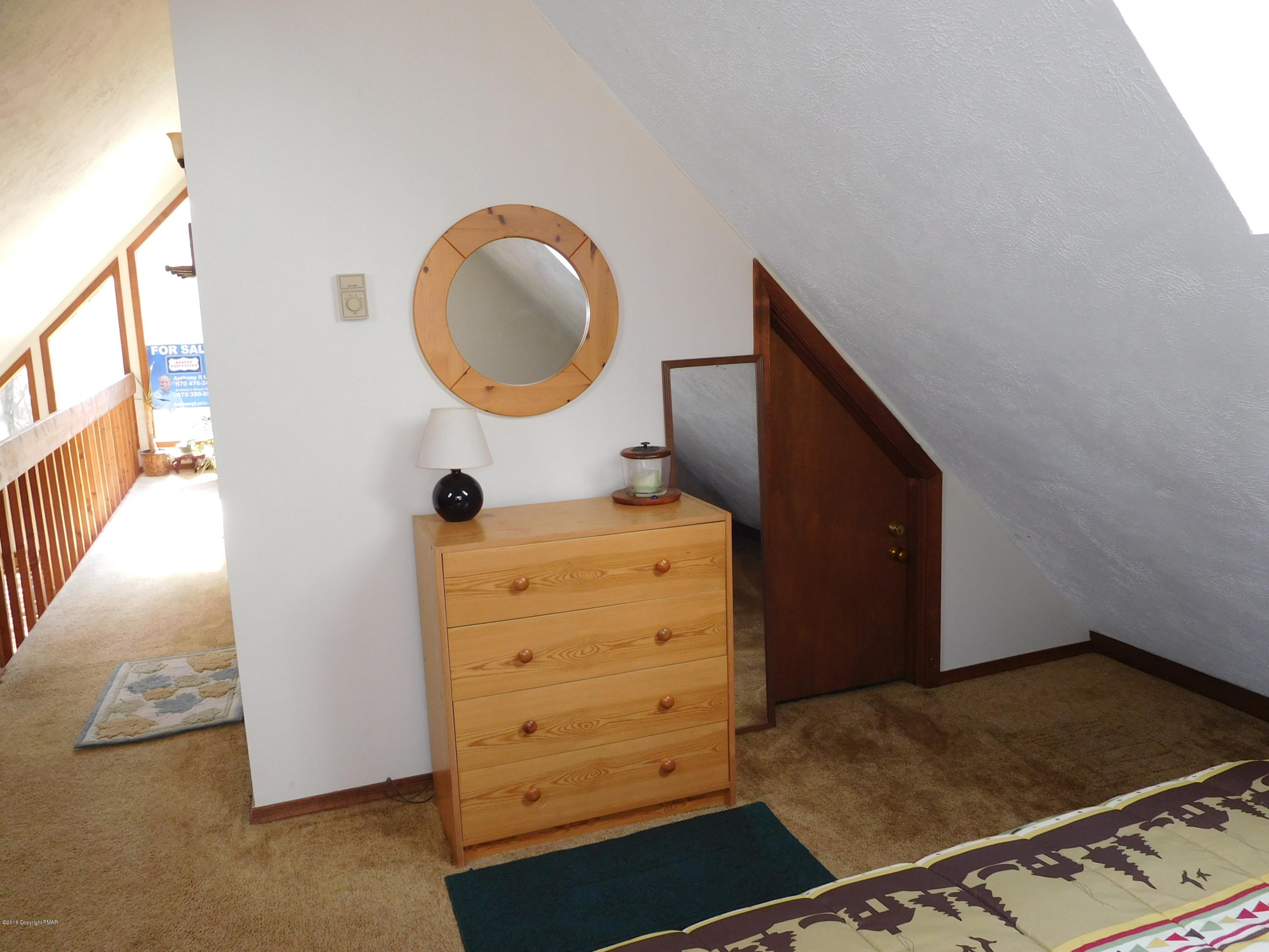 153 Maple Road Blakeslee, PA 18610 - Photo 17 of 32 a view of an entryway with wooden floor