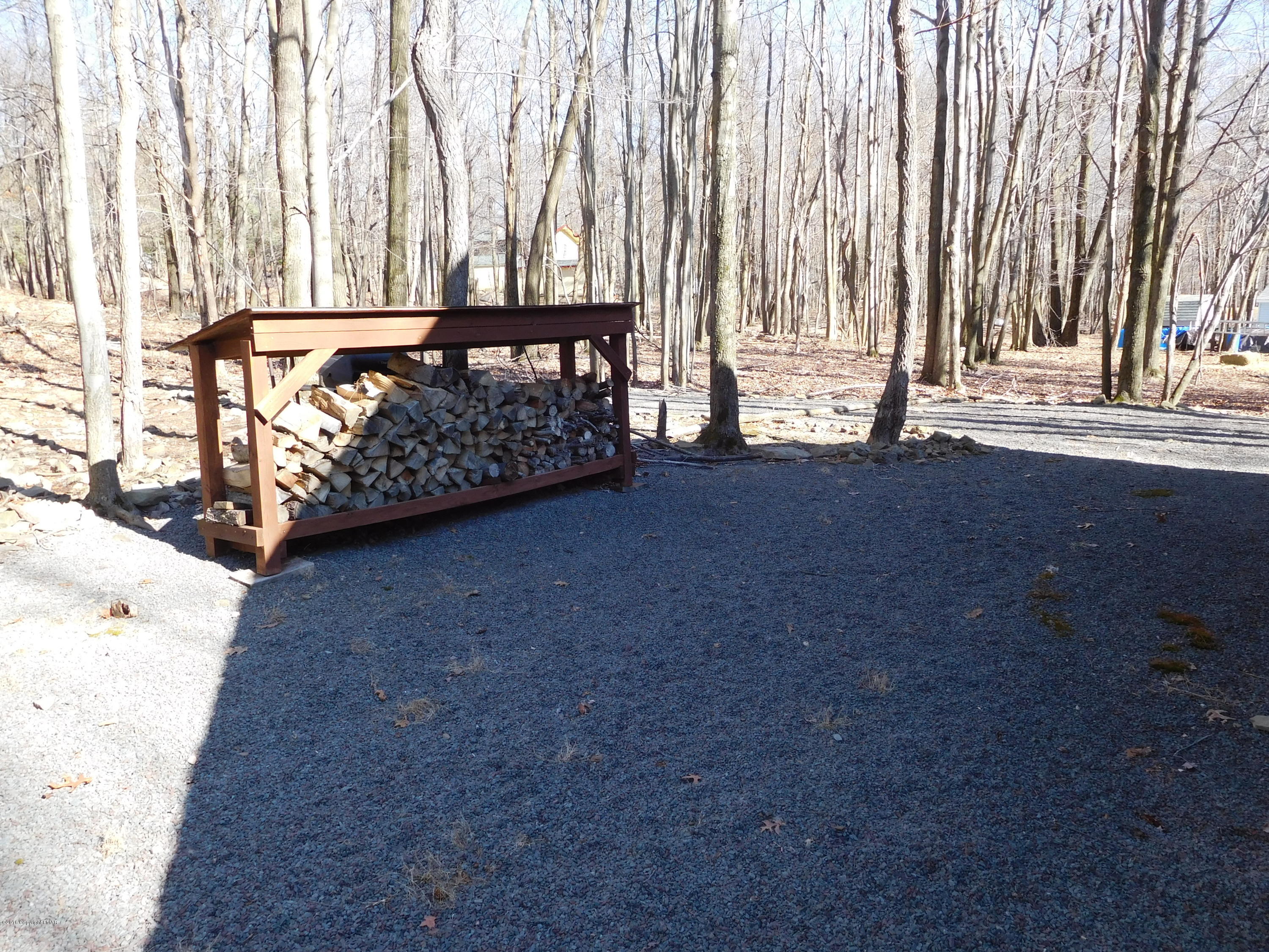 153 Maple Road Blakeslee, PA 18610 - Photo 24 of 32 a view of a room with stairs and a yard