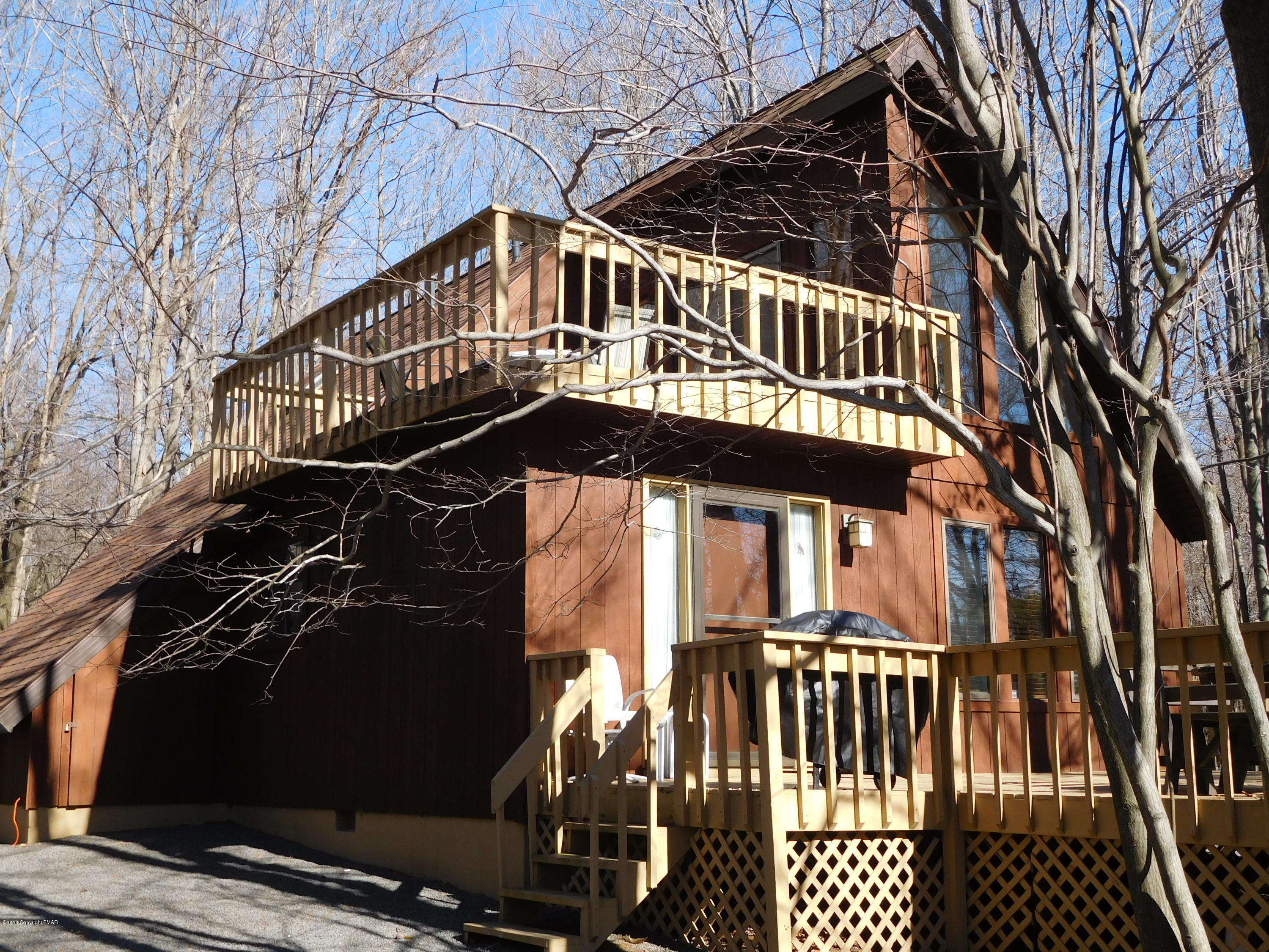 153 Maple Road Blakeslee, PA 18610 - Photo 3 of 32 a view of a house with a deck