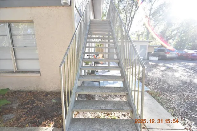 a view of entryway with a front door