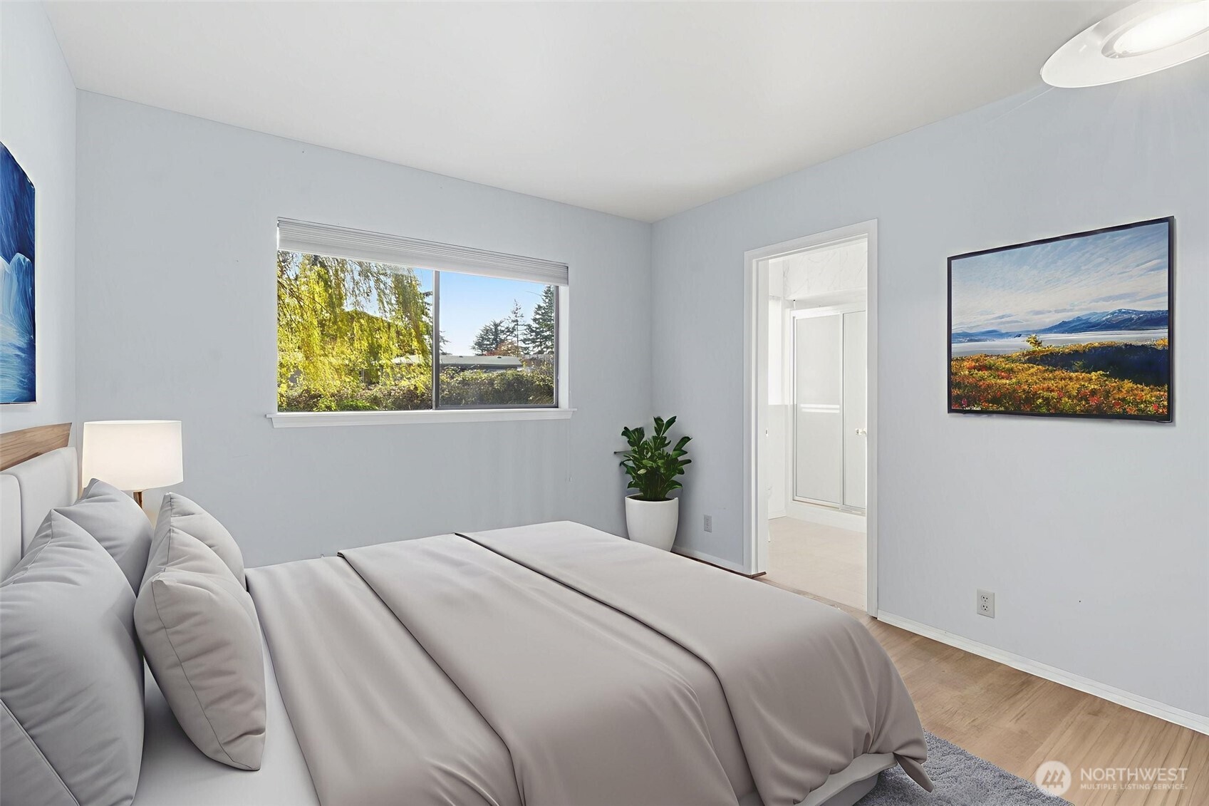 80 Brook Place Tahuya, WA 98588 - Photo 32 of 40 a bedroom with a bed and a painting on the wall