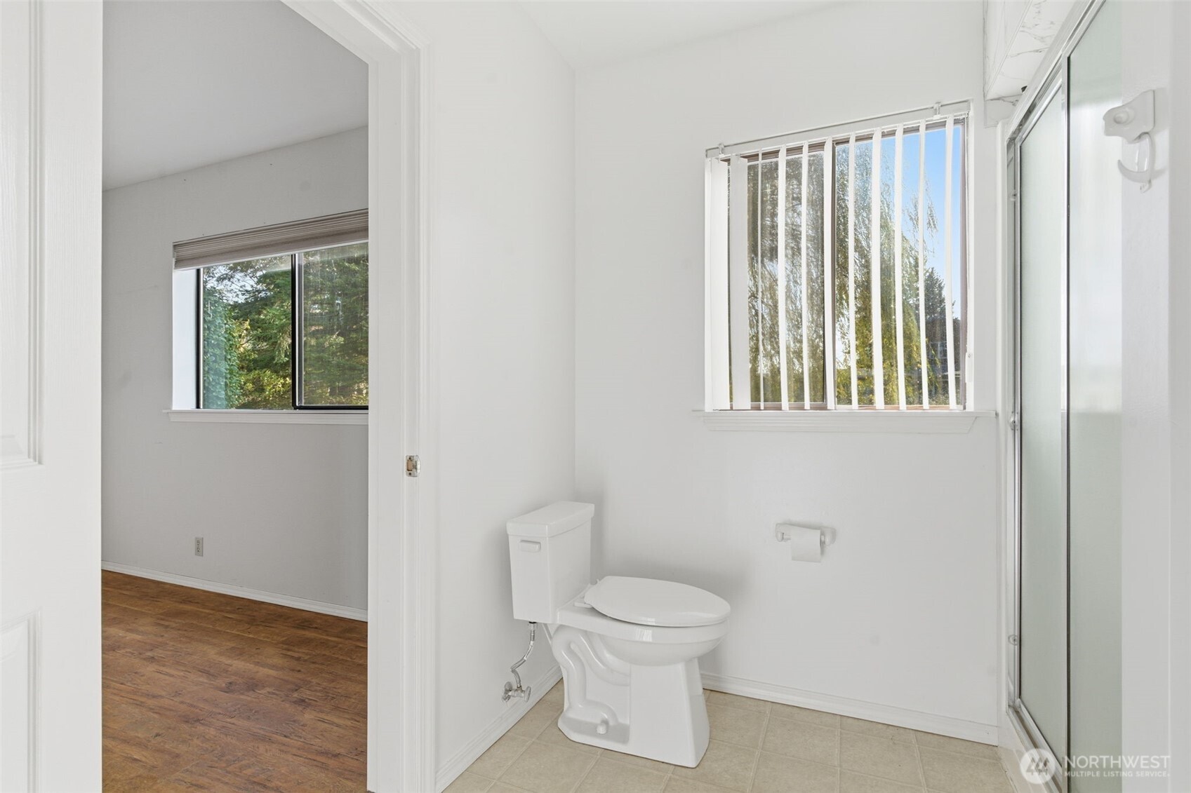 80 Brook Place Tahuya, WA 98588 - Photo 34 of 40 a white toilet sitting next to a bathroom sink