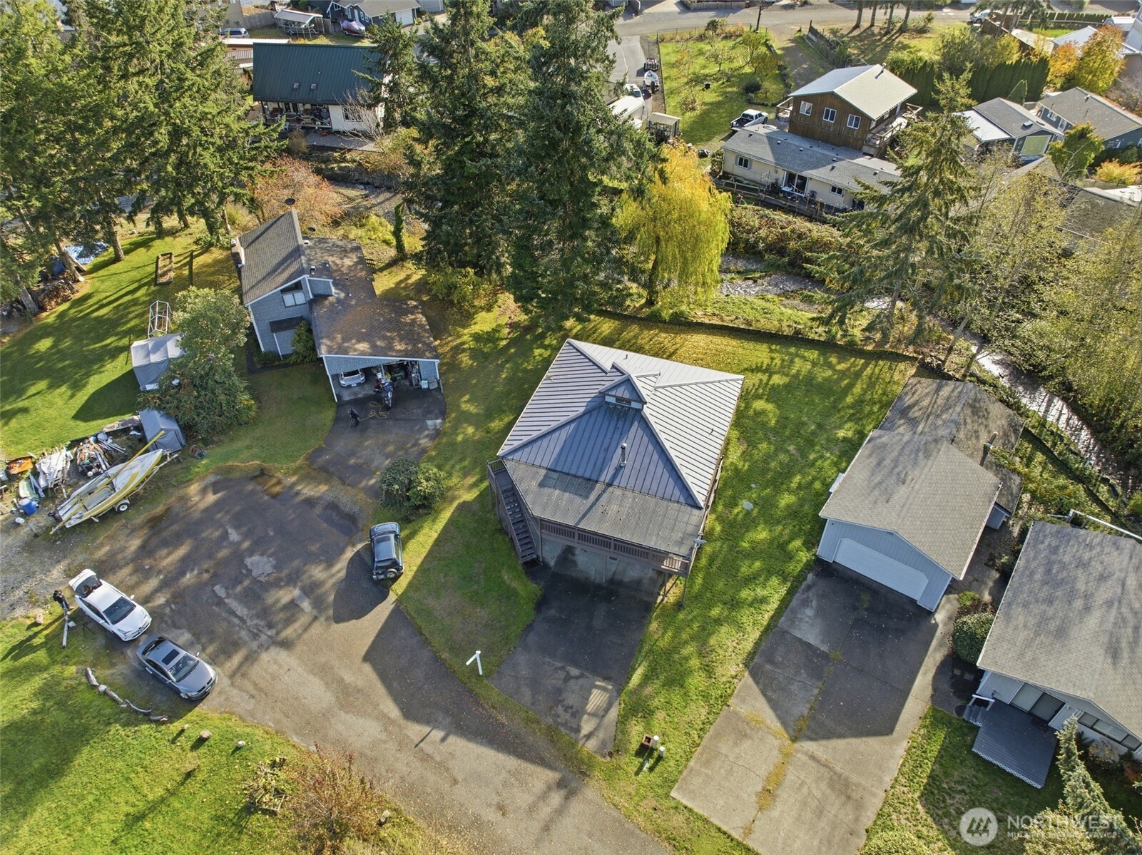 80 Brook Place Tahuya, WA 98588 - Photo 39 of 40 an aerial view of a house with a yard