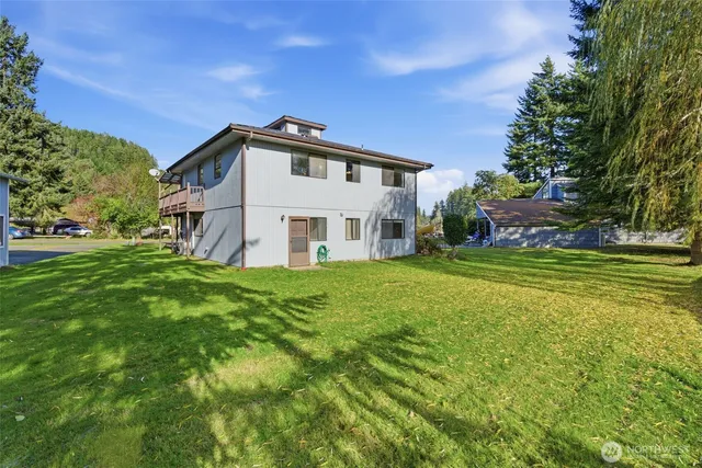 a view of a house with a big yard