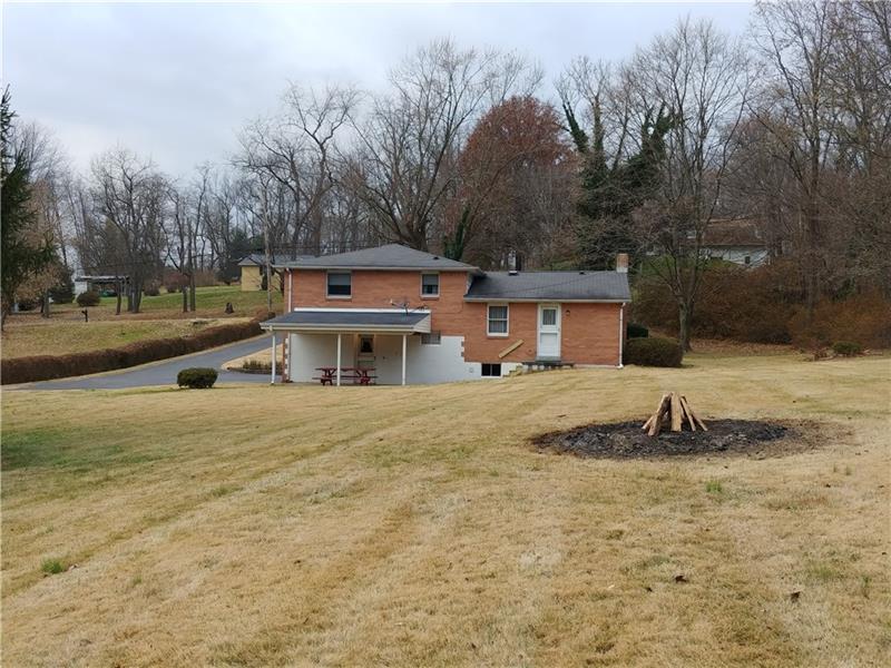 356 Middletown Road New Stanton, PA 15672 - Photo 2 of 15 This is a view of the rear of the home from the backyard.