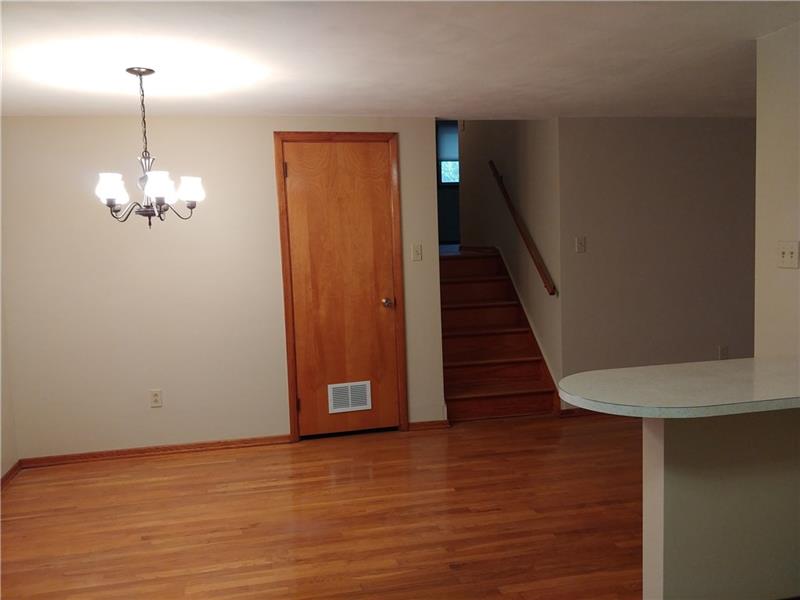 356 Middletown Road New Stanton, PA 15672 - Photo 6 of 15 The flex floor plans offers many possibilities. The steps lead to the upper floor bedrooms and main bath.