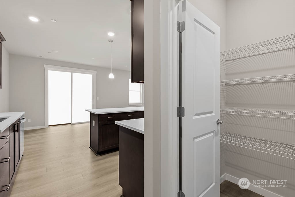 2725 193rd Place Southeast, Unit F6 Bothell, WA 98012 - Photo 20 of 35 a bathroom with a sink and a mirror