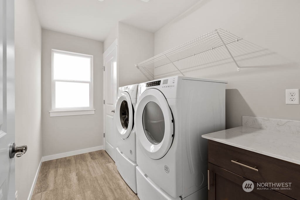 2725 193rd Place Southeast, Unit F6 Bothell, WA 98012 - Photo 23 of 35 a utility room with dryer and washer