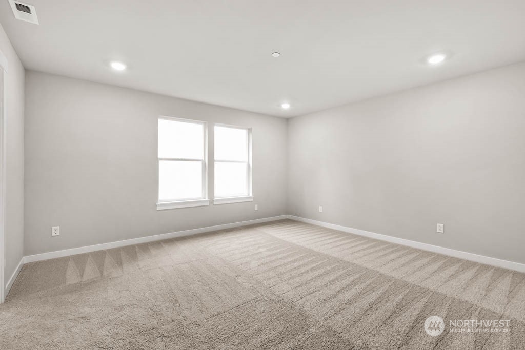 2725 193rd Place Southeast, Unit F6 Bothell, WA 98012 - Photo 24 of 35 an empty room with a window