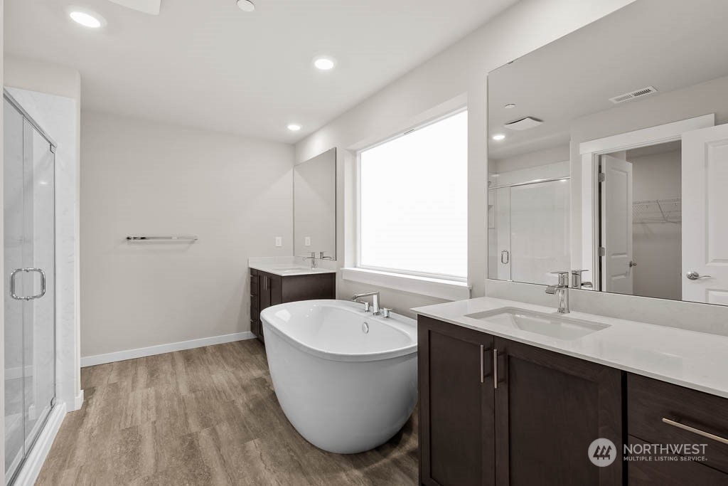 2725 193rd Place Southeast, Unit F6 Bothell, WA 98012 - Photo 26 of 35 a bathroom with a sink and a mirror