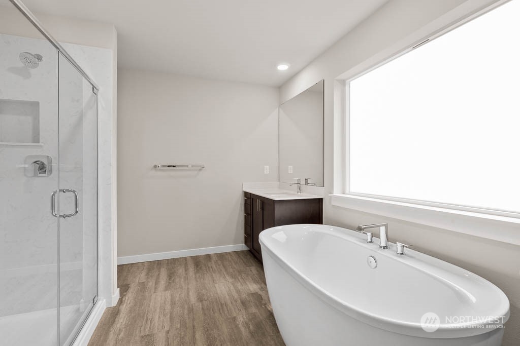 2725 193rd Place Southeast, Unit F6 Bothell, WA 98012 - Photo 28 of 35 a bathroom with a bathtub and shower