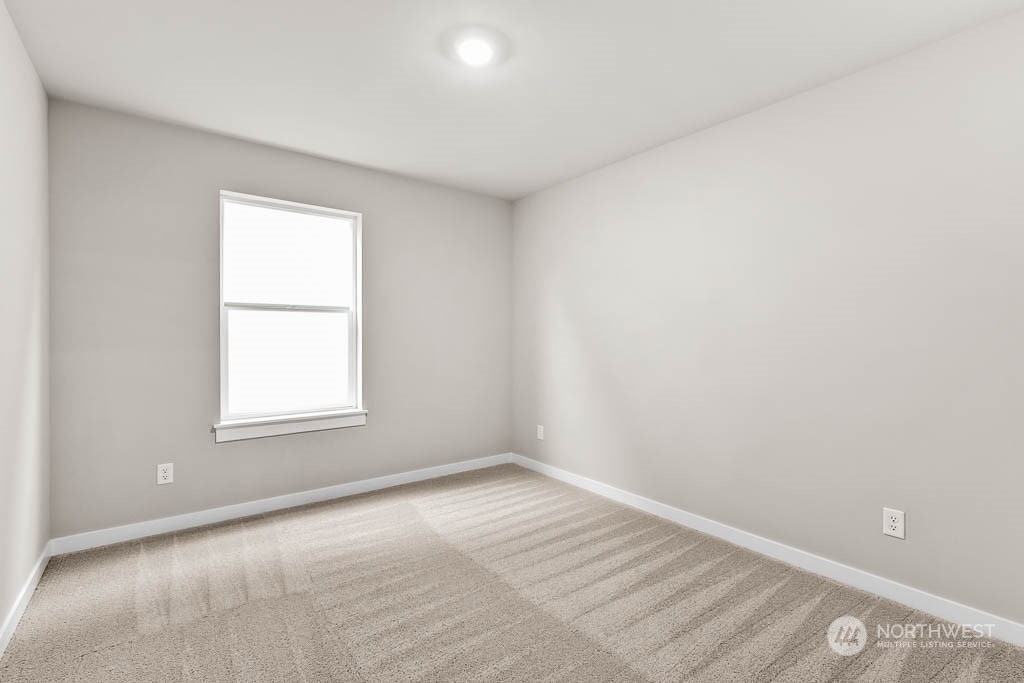 2725 193rd Place Southeast, Unit F6 Bothell, WA 98012 - Photo 30 of 35 an empty room with a window
