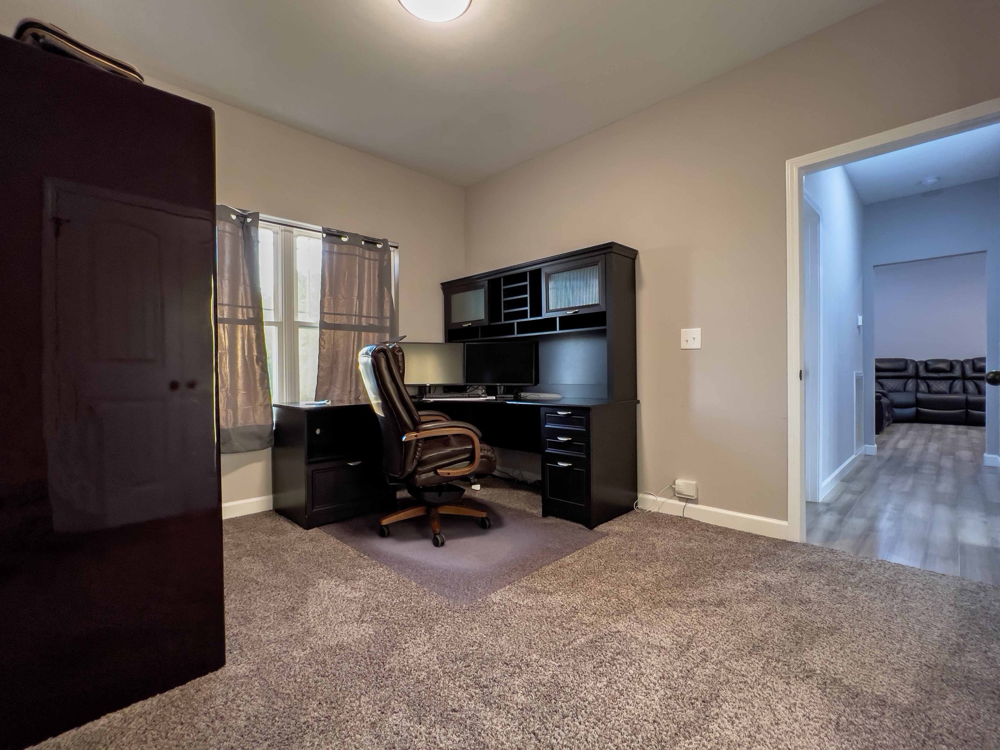 1239 Oak Grove Road Dickson, TN 37055 - Photo 42 of 54 a living room with furniture and a flat screen tv