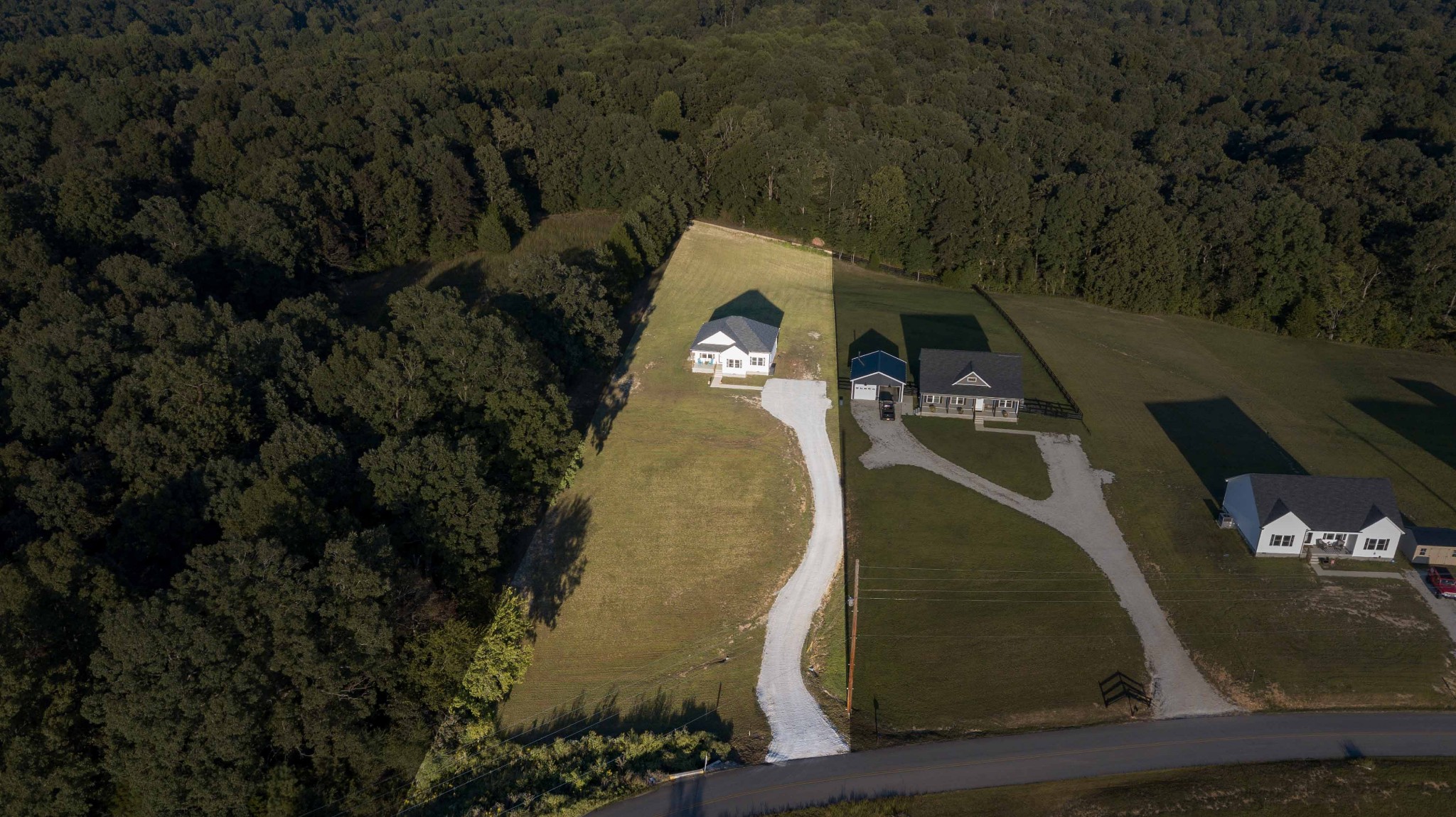 1239 Oak Grove Road Dickson, TN 37055 - Photo 50 of 54 an aerial view of a house with a yard