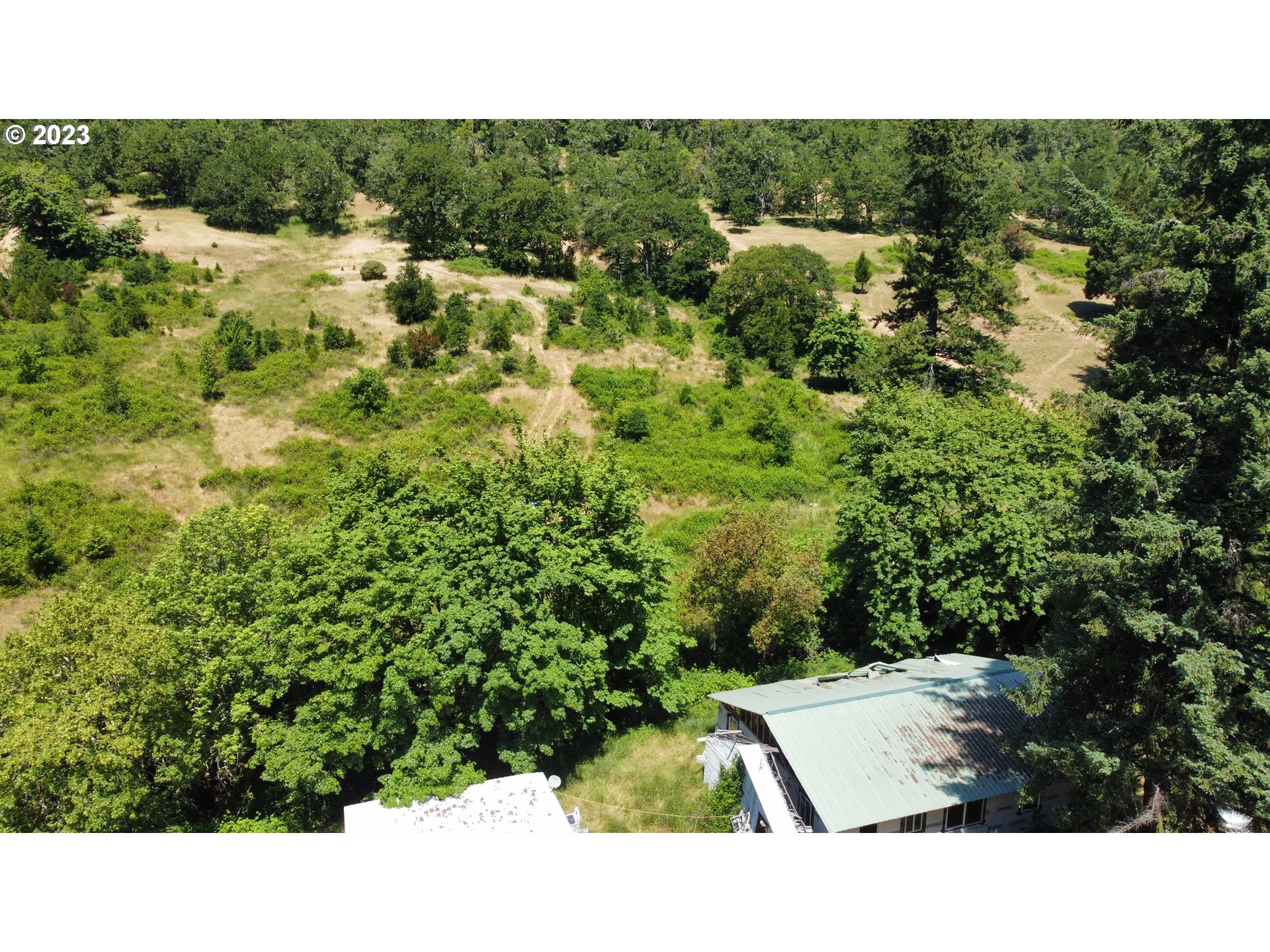 3524 Shoestring Road Riddle, OR 97469 - Photo 5 of 21 a view of a house with a park