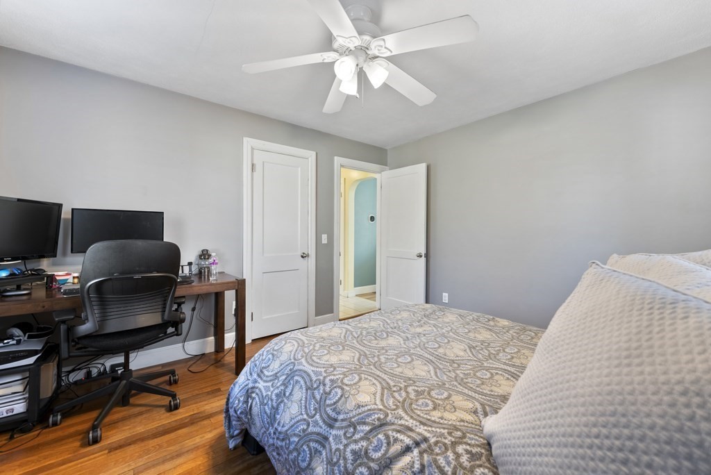 26 Exeter Street West Springfield, MA 01089 - Photo 27 of 42 a bedroom with a bed and a desk