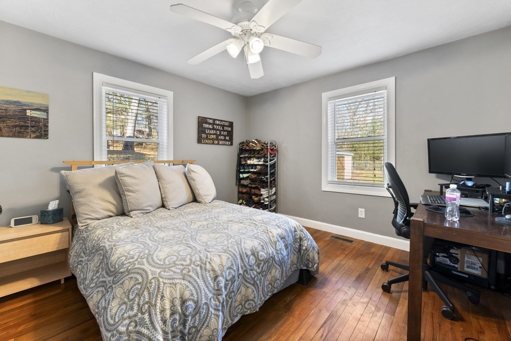 26 Exeter Street West Springfield, MA 01089 - Photo 29 of 42 a bedroom with a bed and a flat screen tv