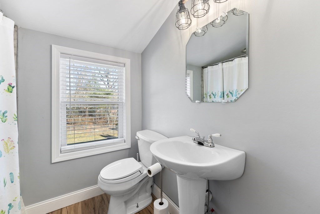 26 Exeter Street West Springfield, MA 01089 - Photo 34 of 42 a bathroom with a sink and a toilet