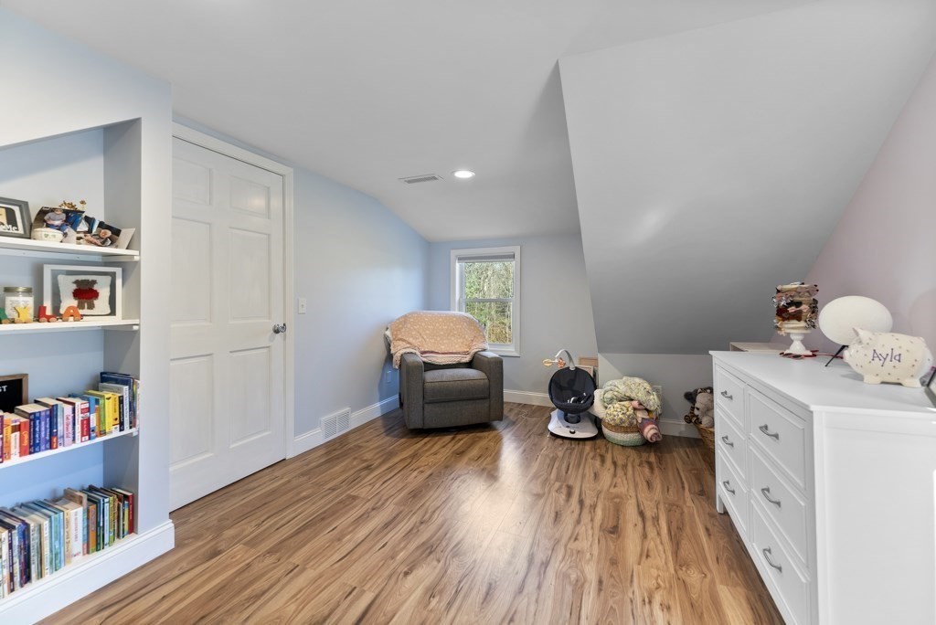 26 Exeter Street West Springfield, MA 01089 - Photo 35 of 42 a bedroom with furniture and wooden floor