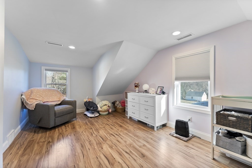 26 Exeter Street West Springfield, MA 01089 - Photo 36 of 42 a room with furniture a flat screen tv and a window