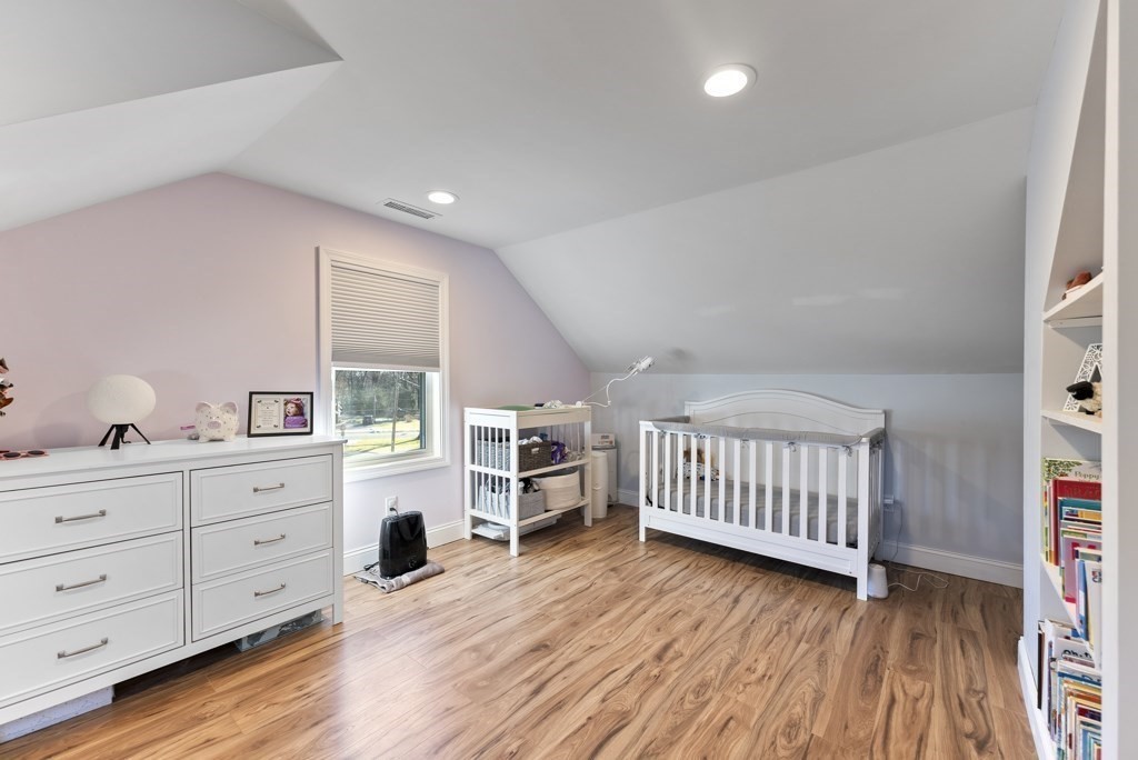 26 Exeter Street West Springfield, MA 01089 - Photo 37 of 42 a view of a bedroom with furniture and windows