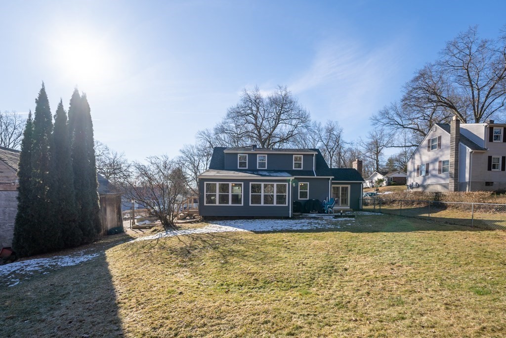 26 Exeter Street West Springfield, MA 01089 - Photo 7 of 42 a view of house with yard and trees in the background