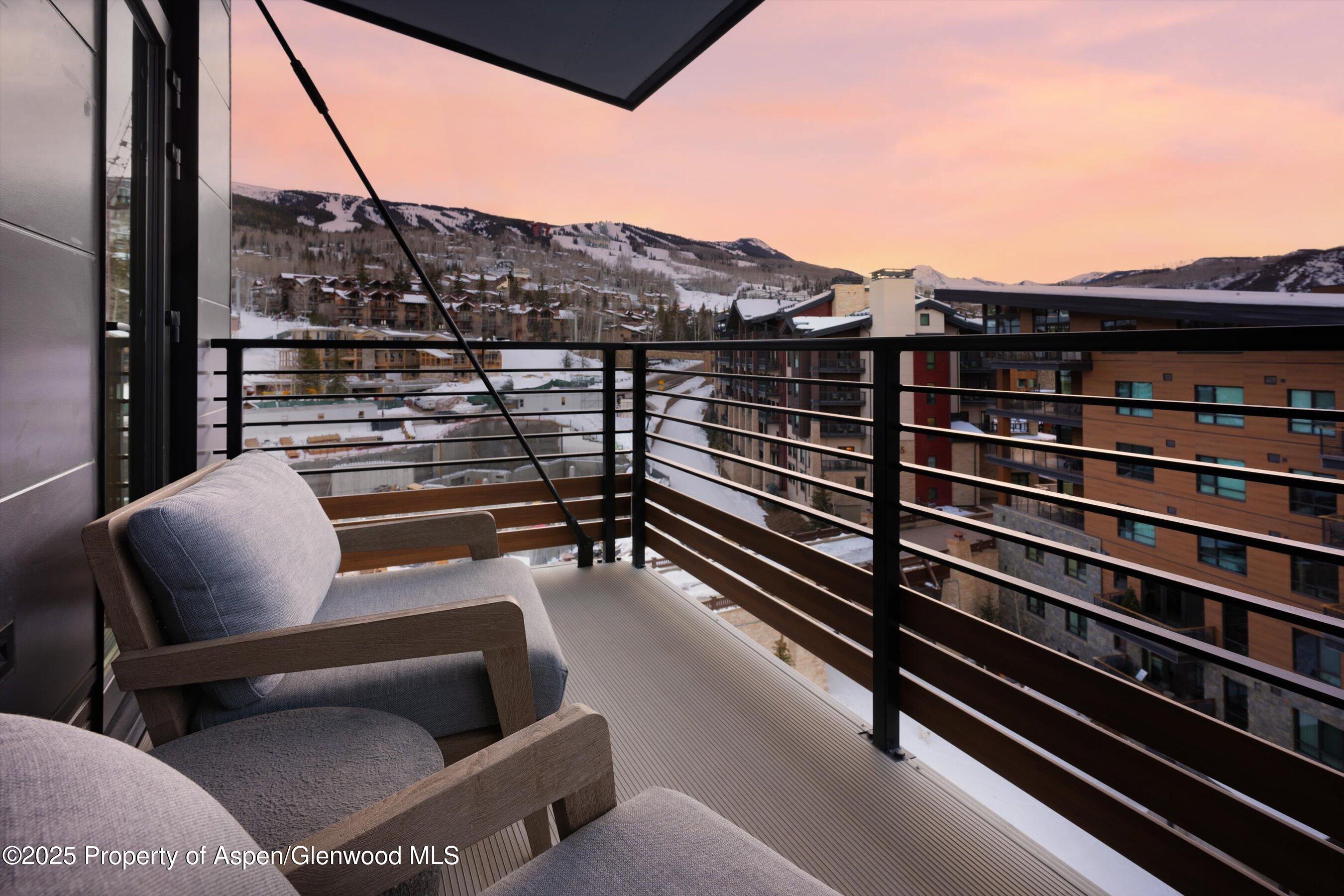 119 Wood Road, Unit 601 Snowmass Village, CO 81615 - Photo 20 of 20 a view of a chairs in the roof deck