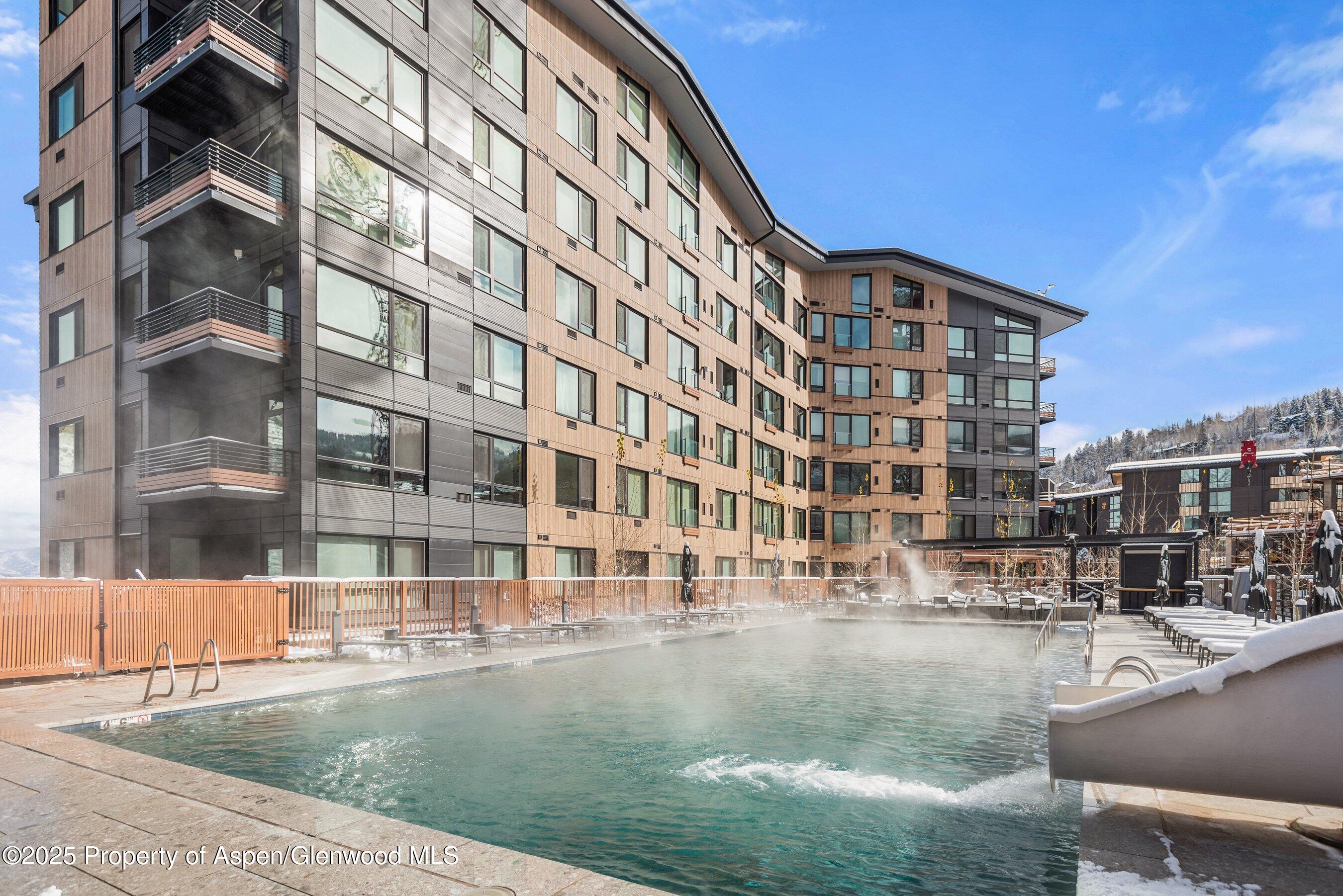 119 Wood Road, Unit 601 Snowmass Village, CO 81615 - Photo 5 of 20 a view of a tall building