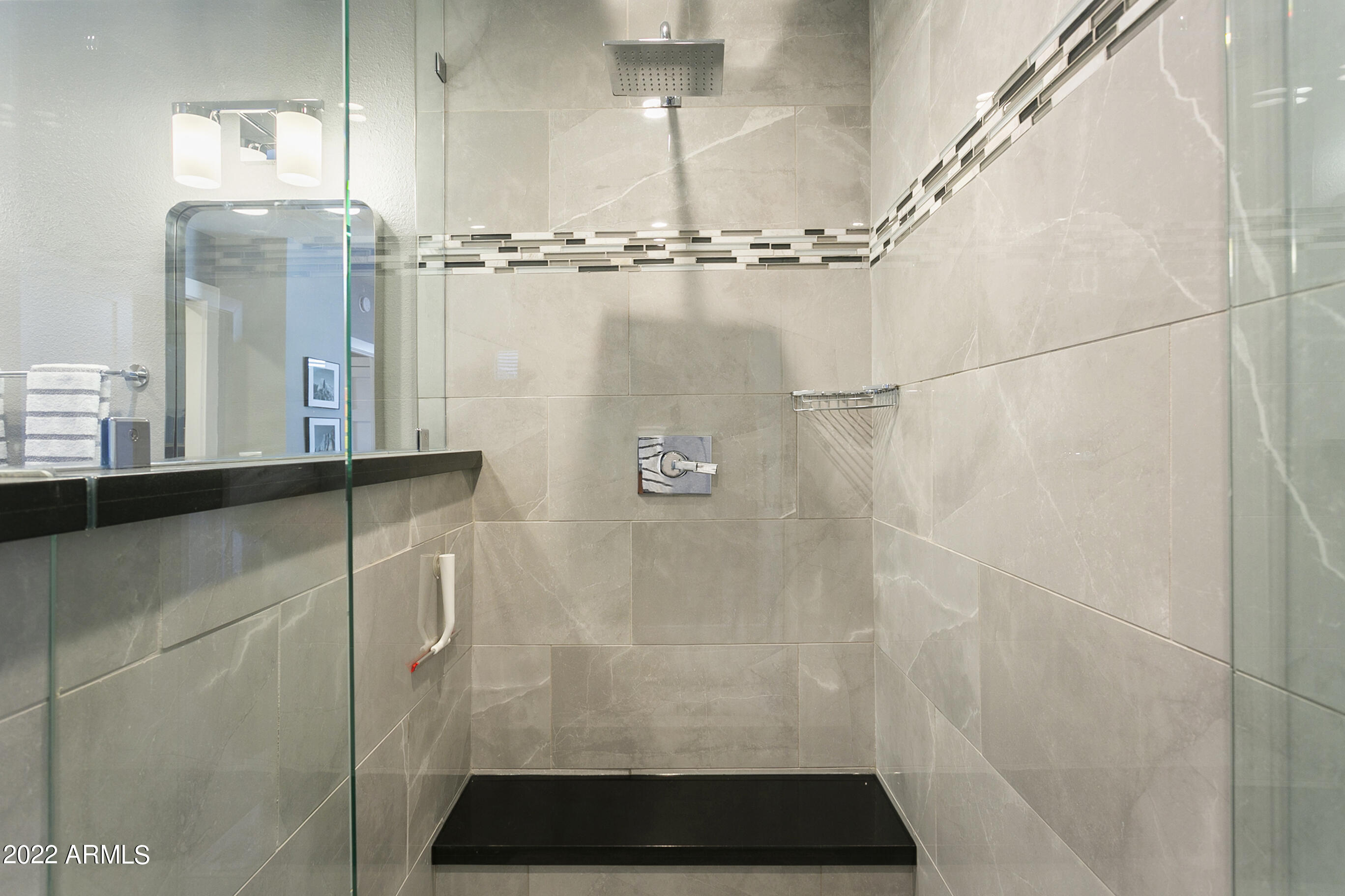 7700 East Gainey Ranch Road, Unit 206 Scottsdale, AZ 85258 - Photo 20 of 33 a bathroom with a shower
