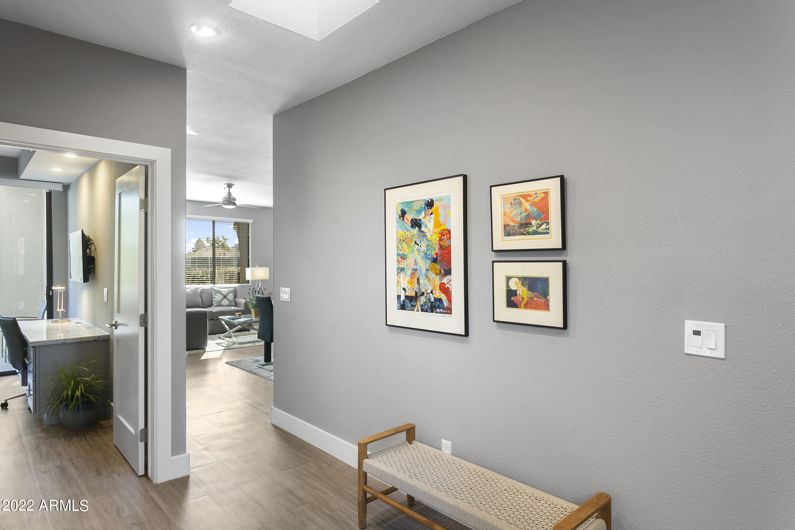 7700 East Gainey Ranch Road, Unit 206 Scottsdale, AZ 85258 - Photo 22 of 33 a view of a hallway with workspace