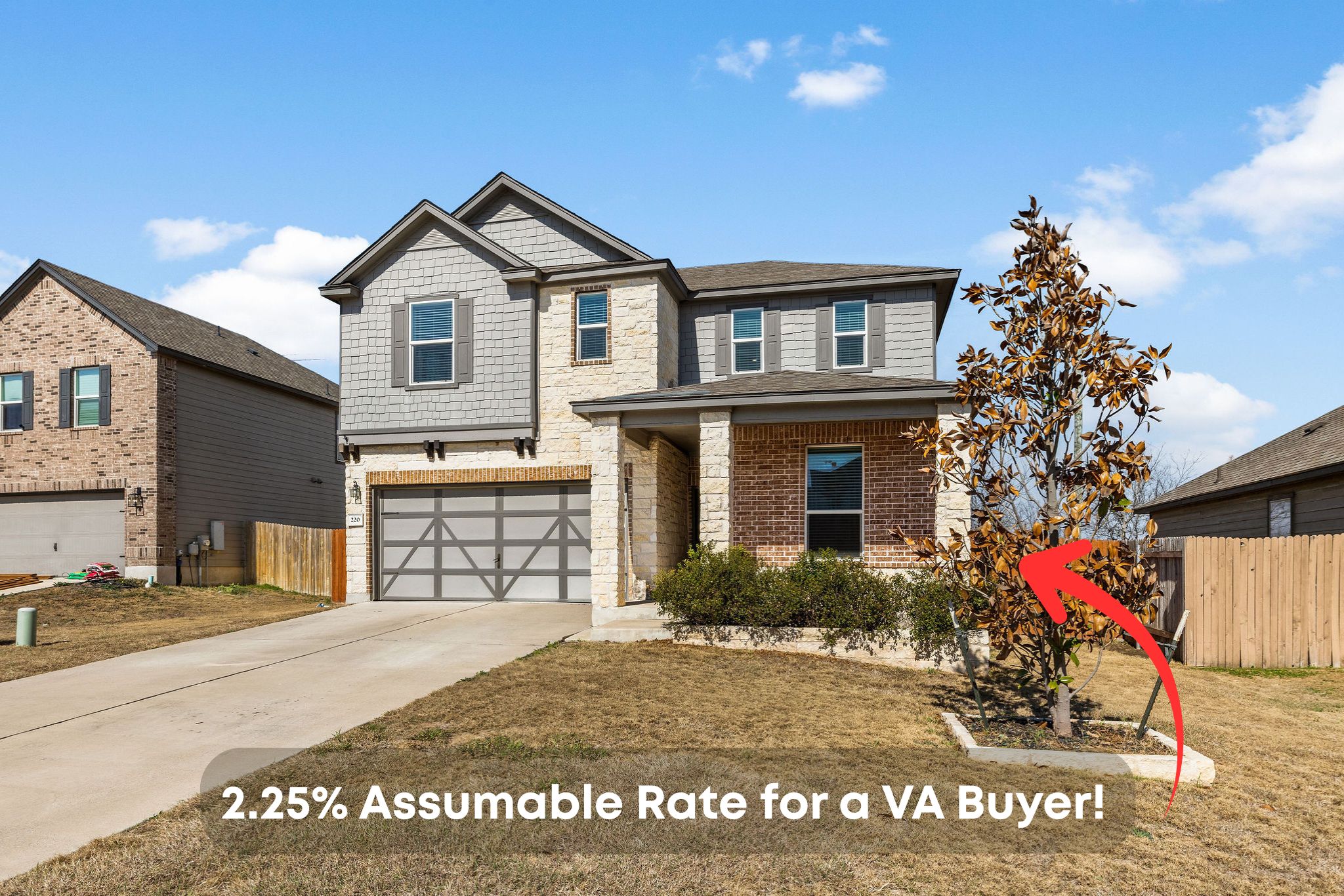a front view of a house with a garage