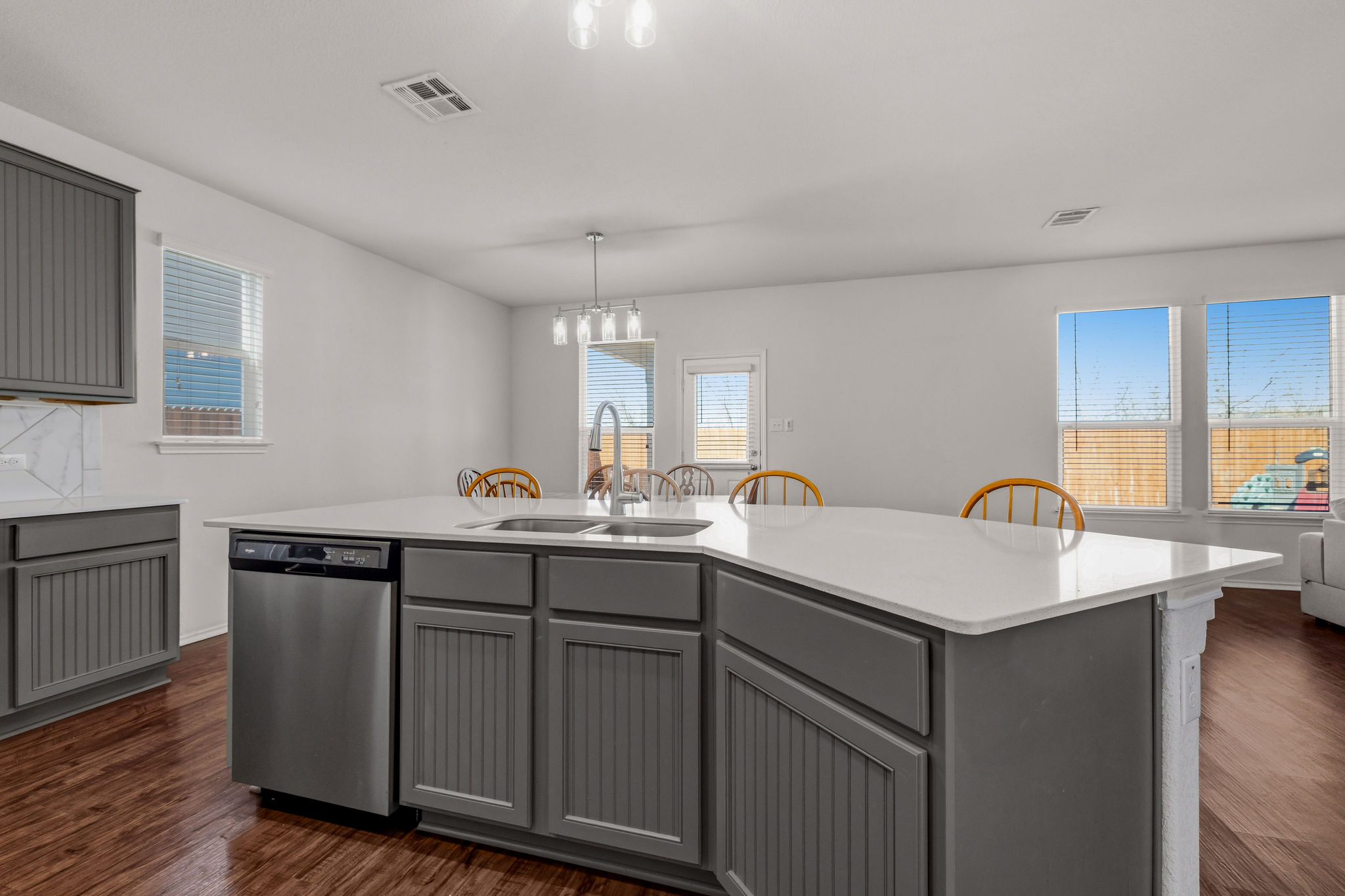 220 Saranac Drive Elgin, TX 78621 - Photo 14 of 32 a kitchen with sink and cabinets