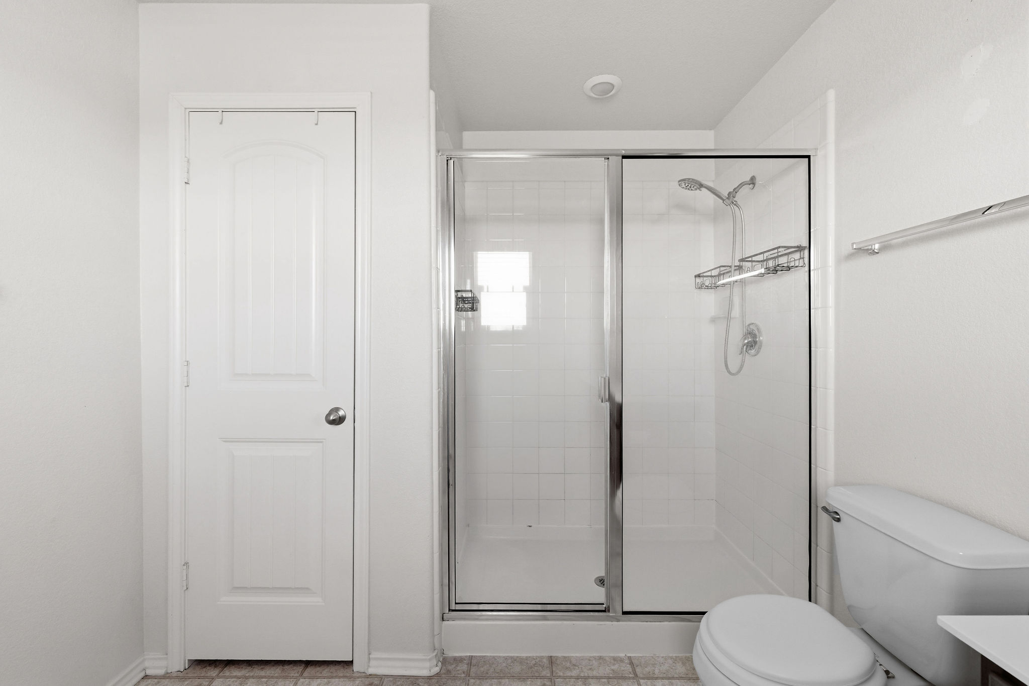220 Saranac Drive Elgin, TX 78621 - Photo 22 of 32 a bathroom with a shower and a toilet