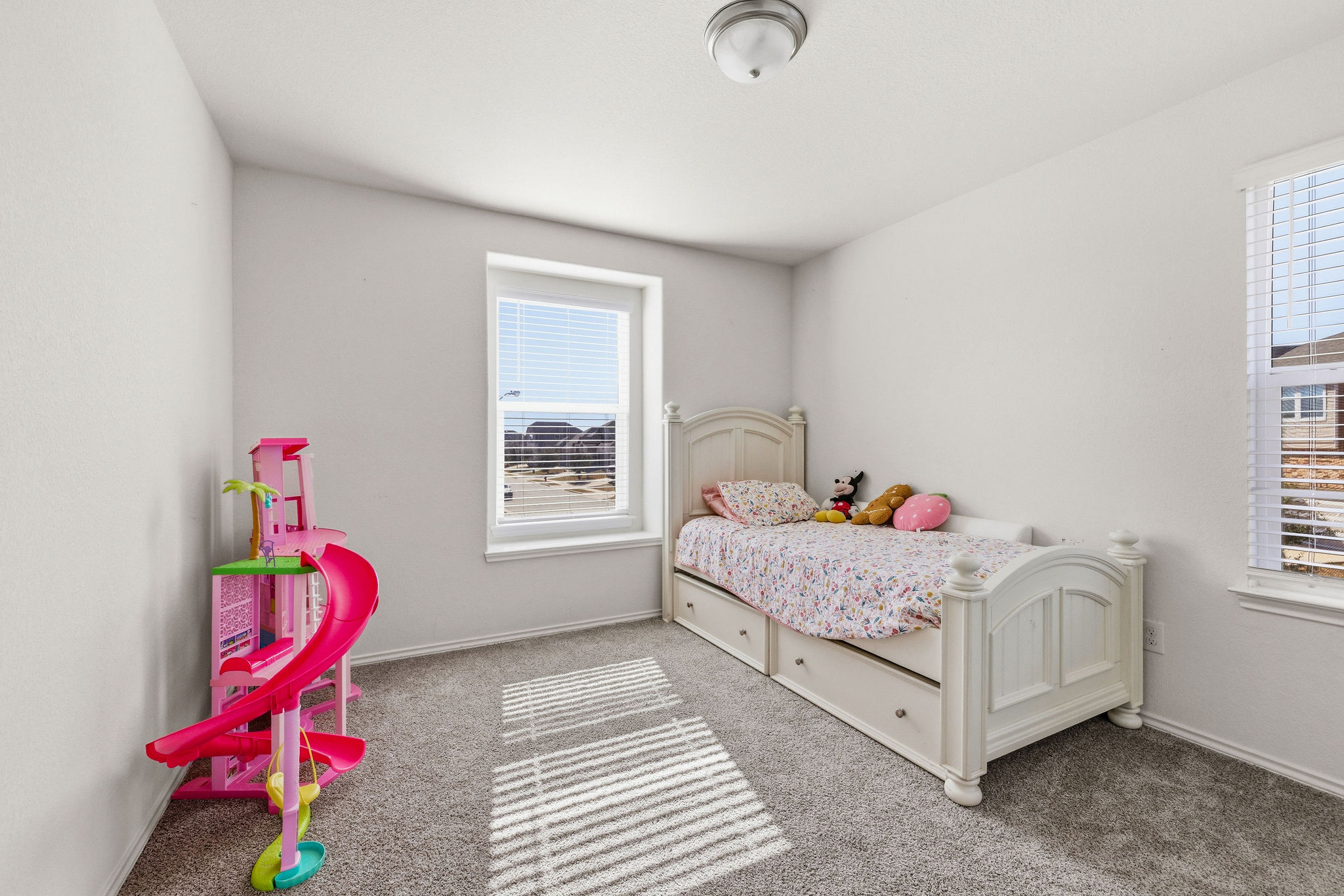 220 Saranac Drive Elgin, TX 78621 - Photo 26 of 32 a bedroom with a bed and a window