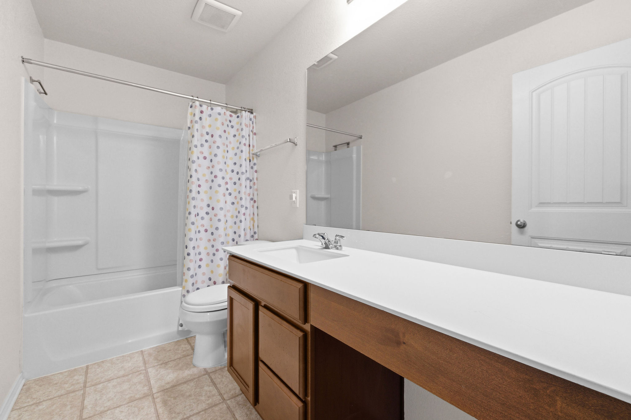 220 Saranac Drive Elgin, TX 78621 - Photo 27 of 32 a bathroom with a sink a toilet and shower