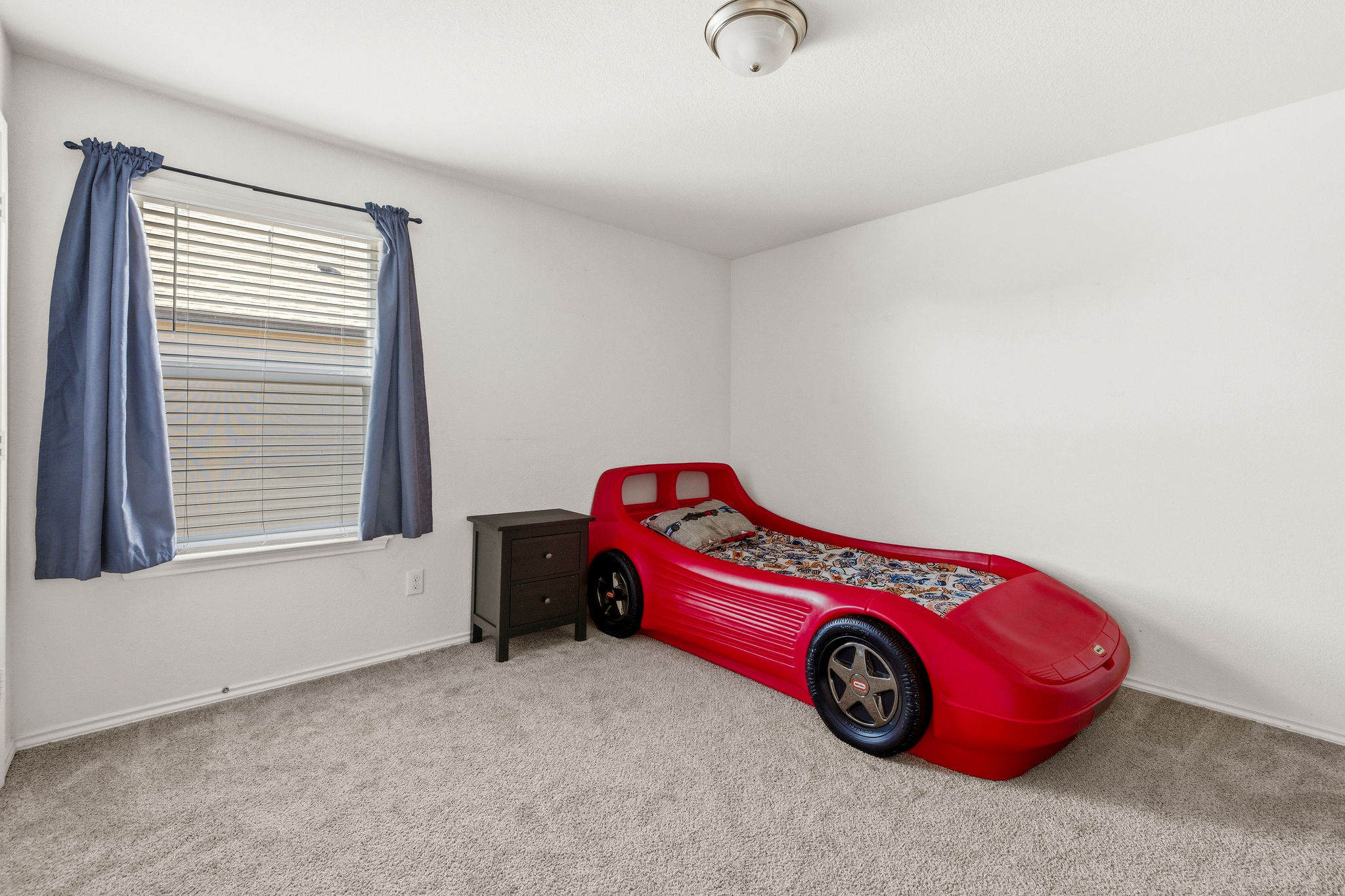 220 Saranac Drive Elgin, TX 78621 - Photo 28 of 32 a view of a car in garage