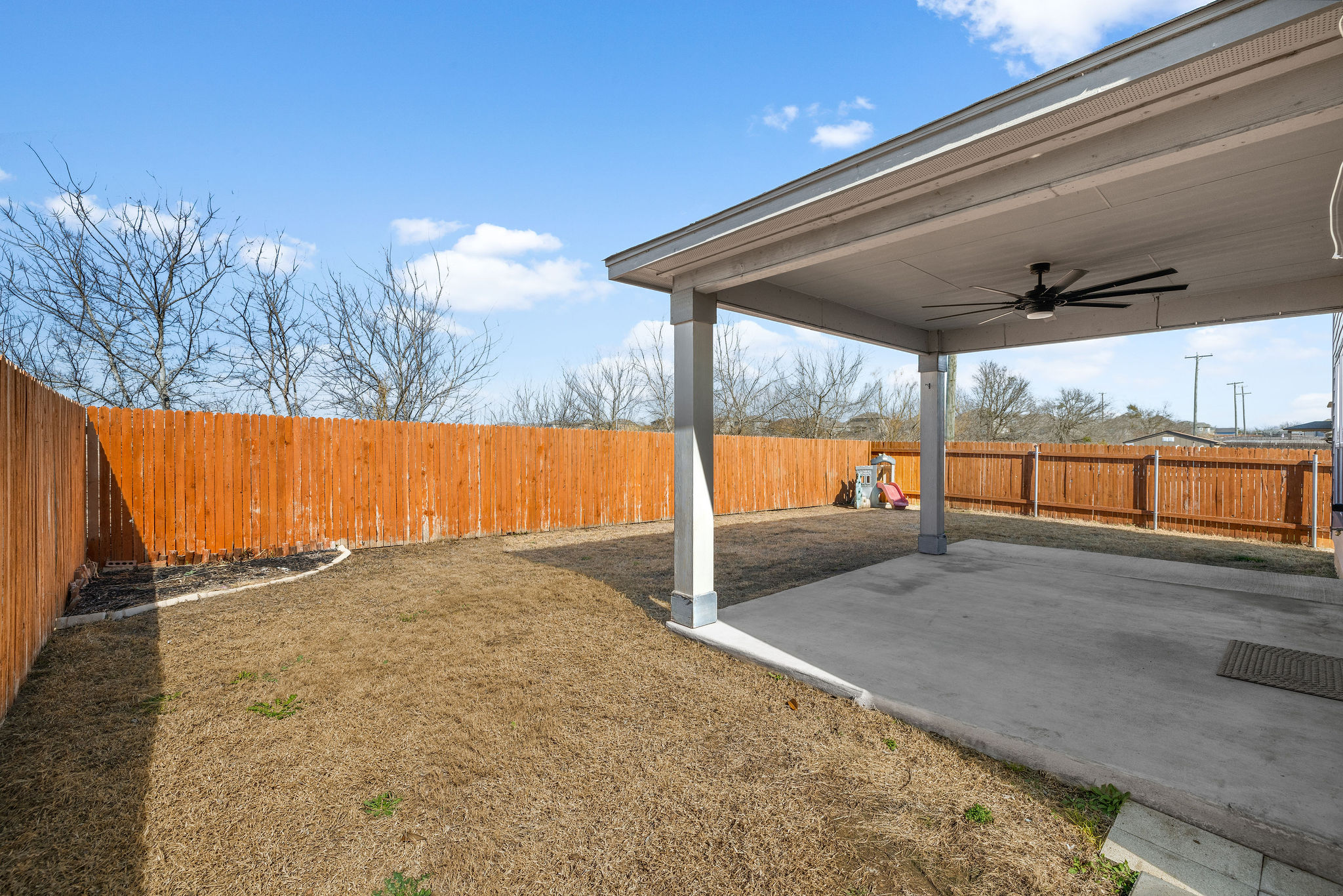 220 Saranac Drive Elgin, TX 78621 - Photo 32 of 32 a view of a backyard of the house