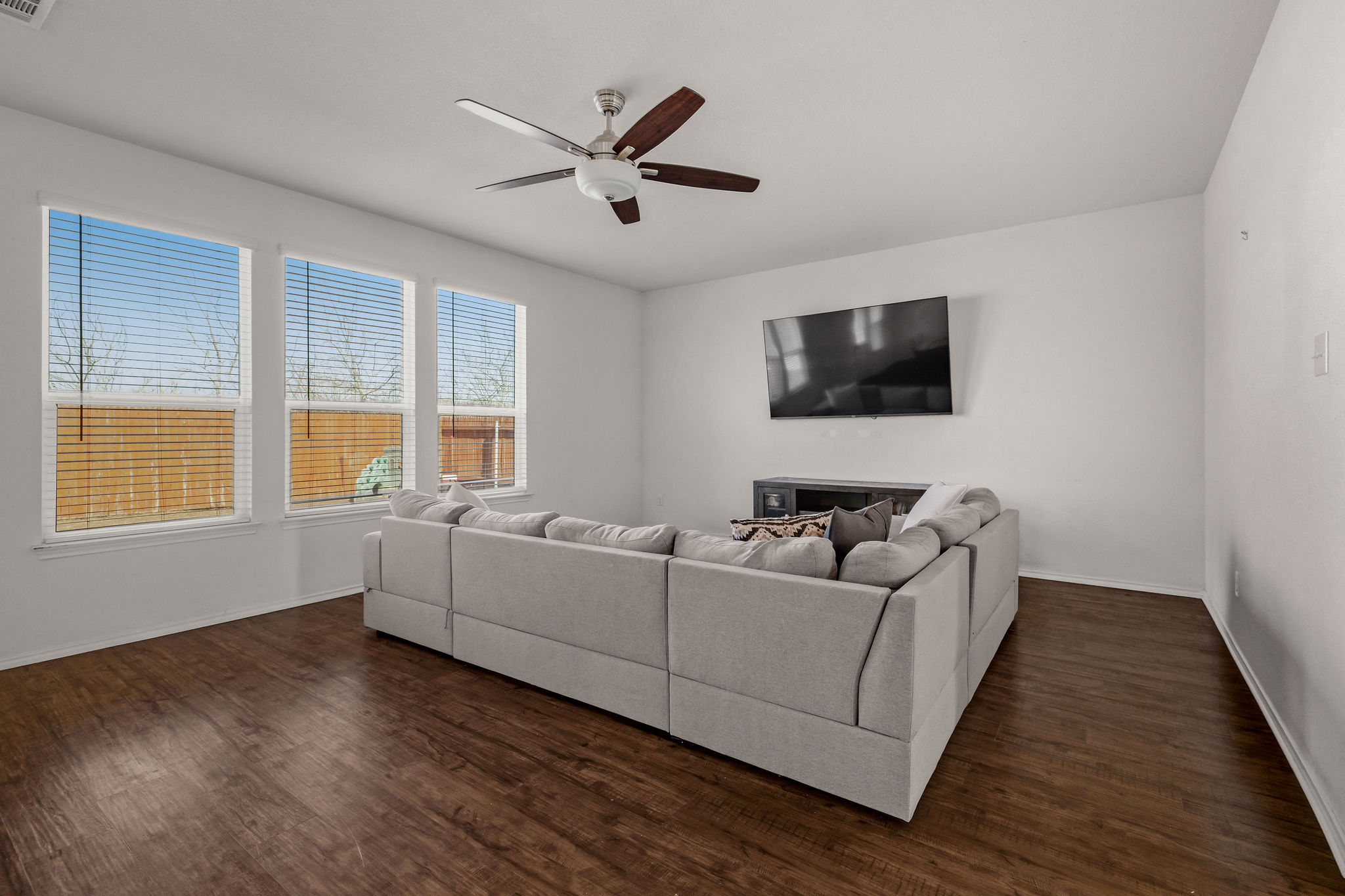 220 Saranac Drive Elgin, TX 78621 - Photo 9 of 32 a living room with furniture and a flat screen tv
