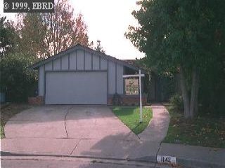 1142 Langlie Court Rodeo, CA 94572 - Photo 1 of 1 a front view of a house with garden